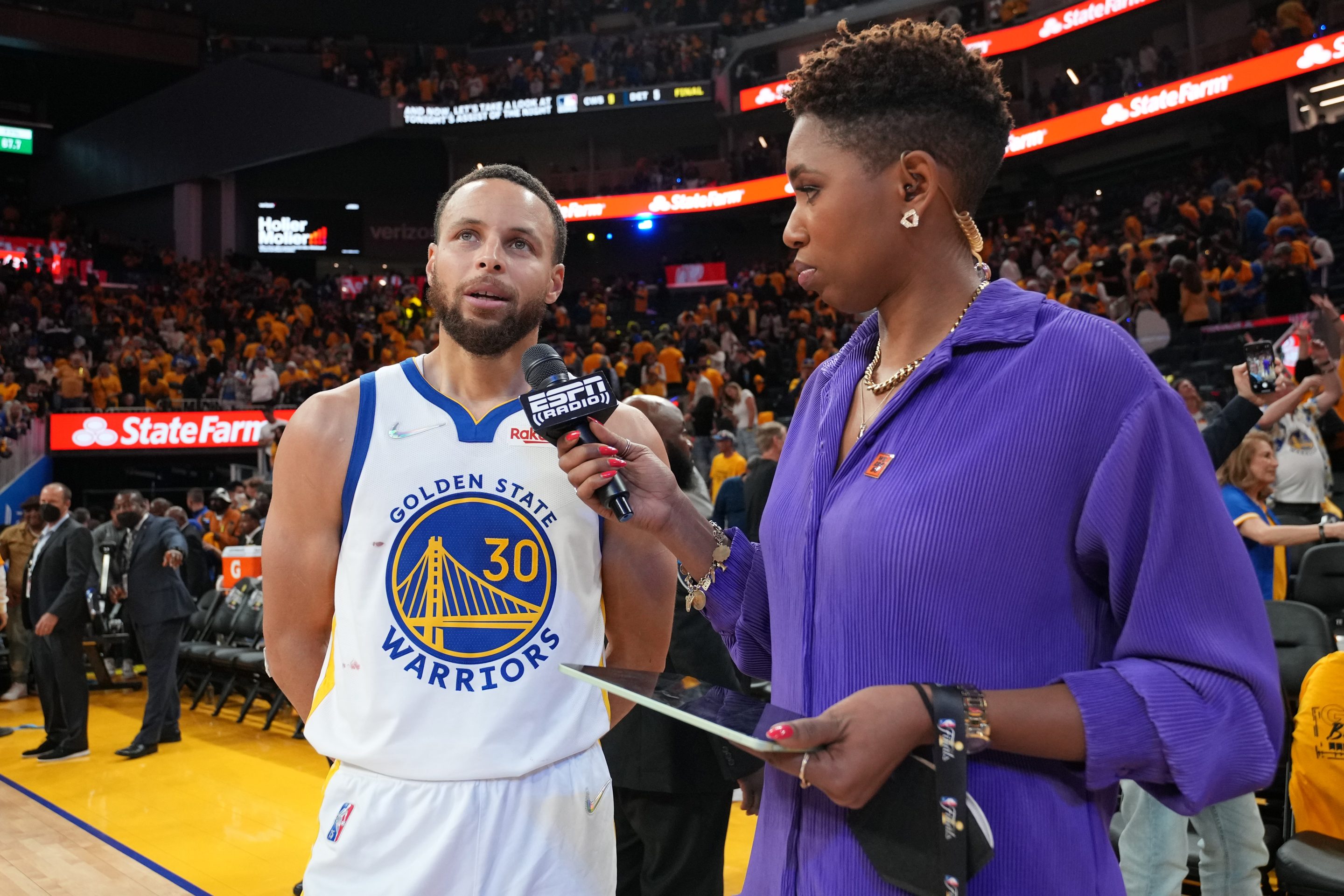 ESPN reporter Monica McNutt interviews Stephen Curry of the Golden State Warriors.