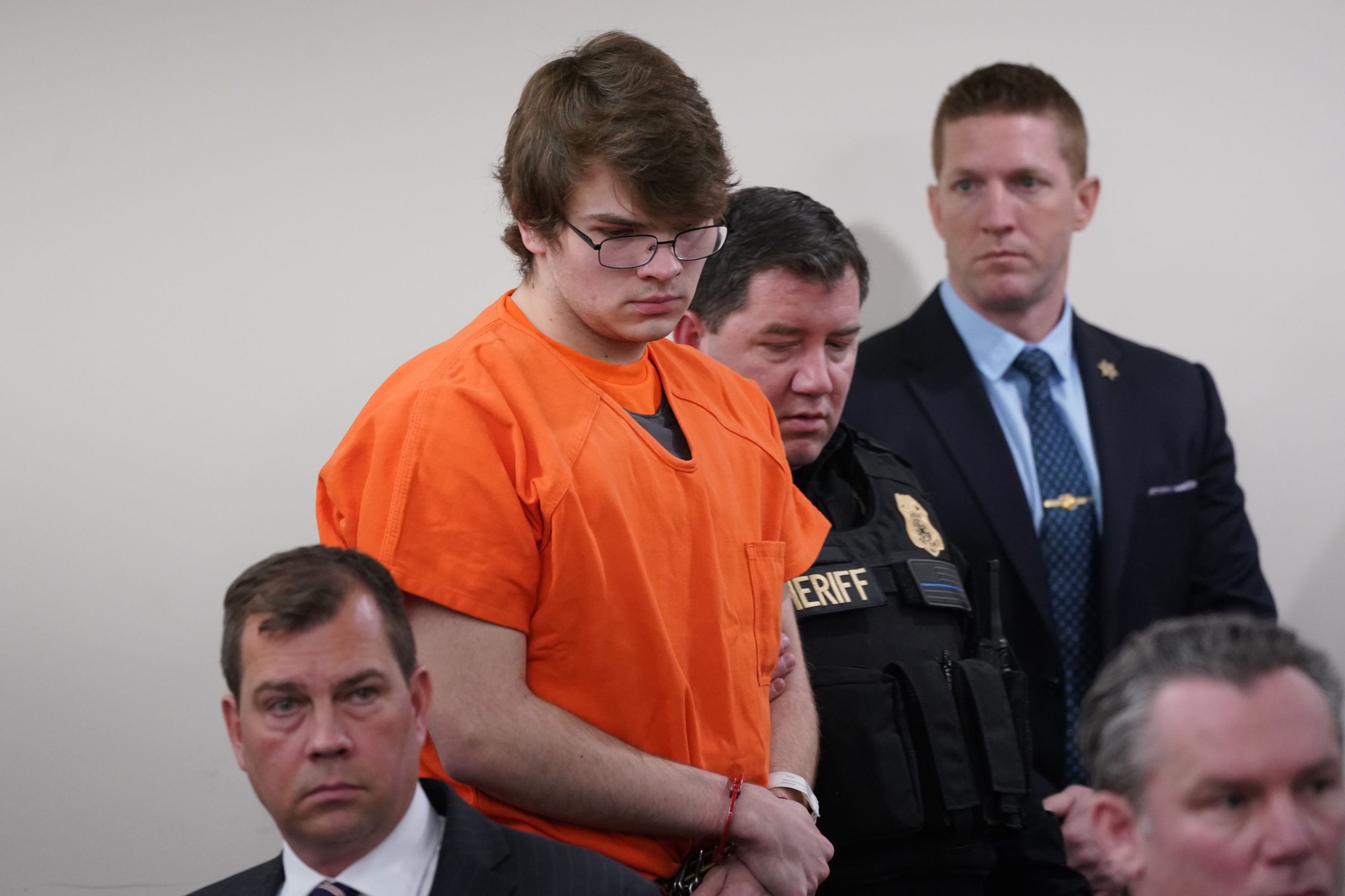 Payton Gendron (C) is serving life in prison for the Buffalo shooting after pleading guilty.