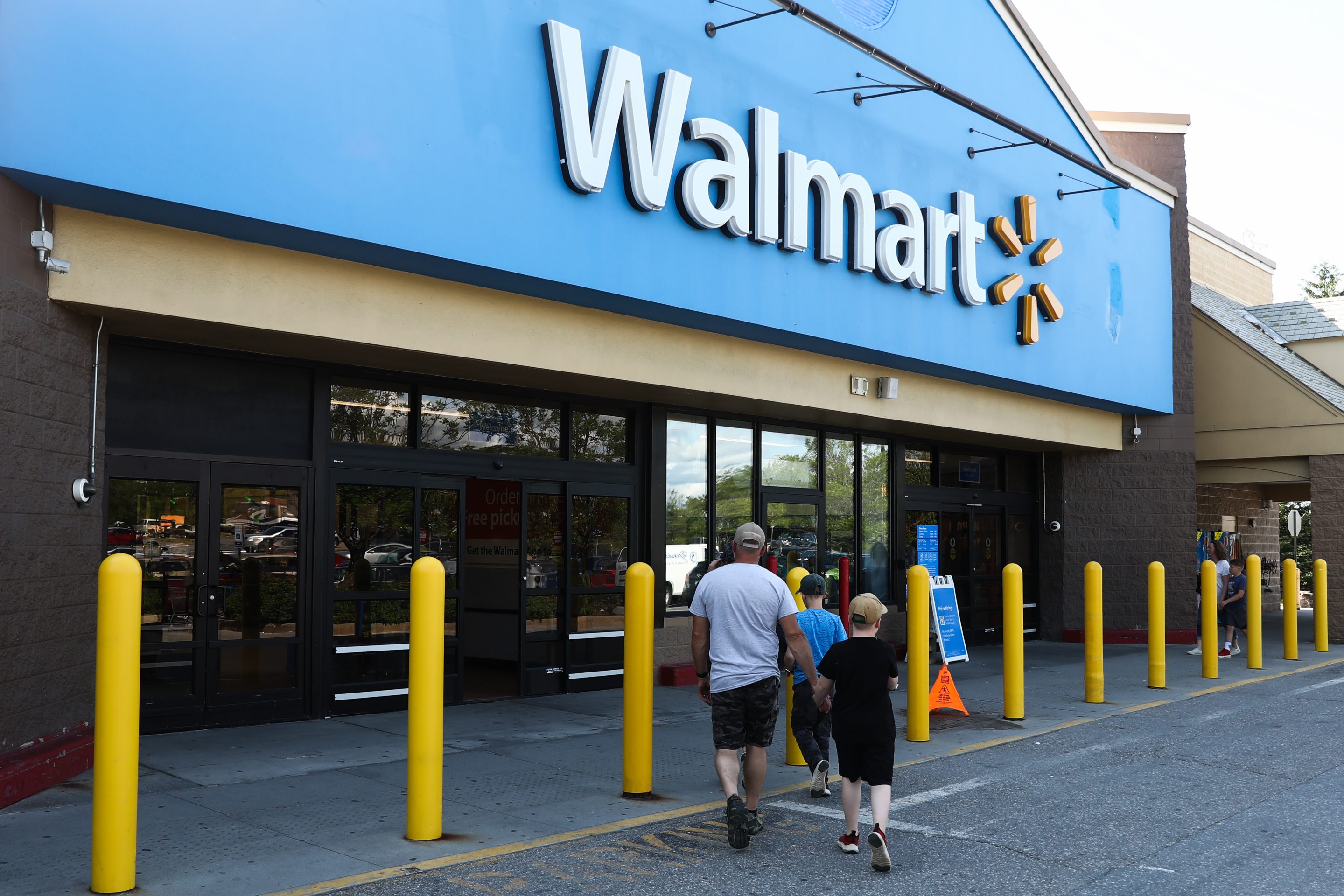 Retailers like Walmart expect a slowdown in spending later this year. 