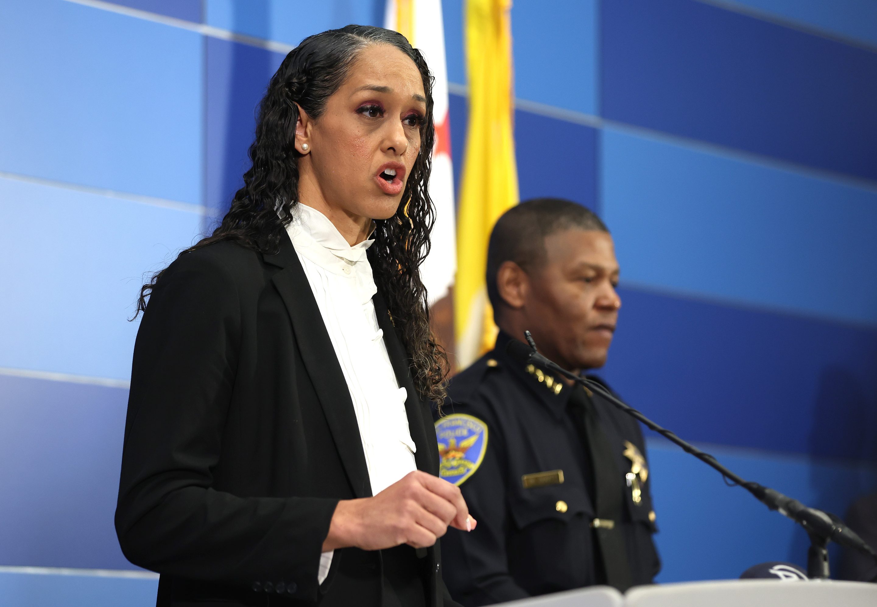 San Francisco district attorney Brooke Jenkins (L) speaks next to San Francisco police chief William Scott.
