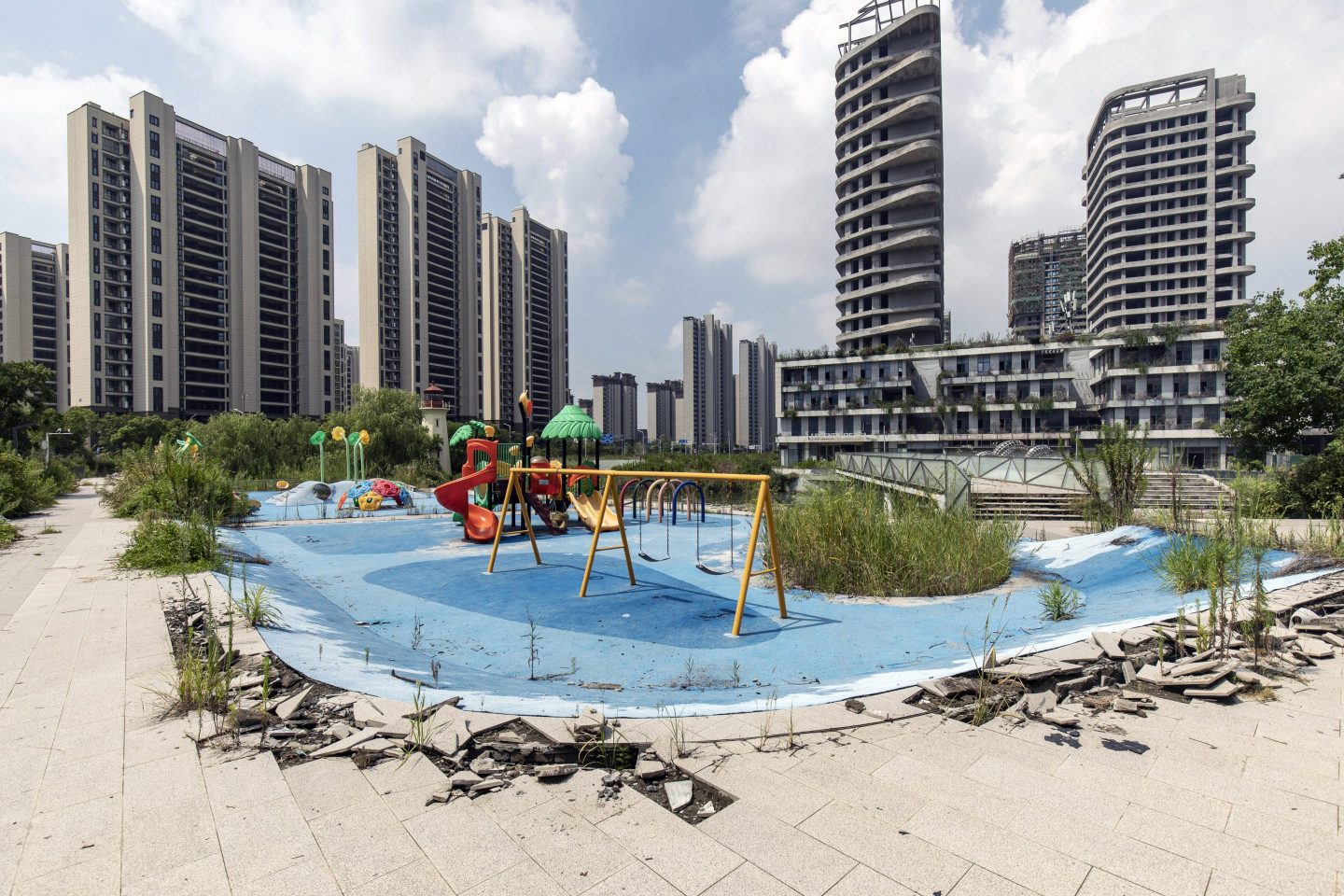 A deserted playground in front of residential buildings at the Legend of Sea project, codeveloped by Country Garden Holdings and Jiangsu Zhongnan Construction Industry Group, in Ningbo, China, on Wednesday, Aug. 16, 2023.