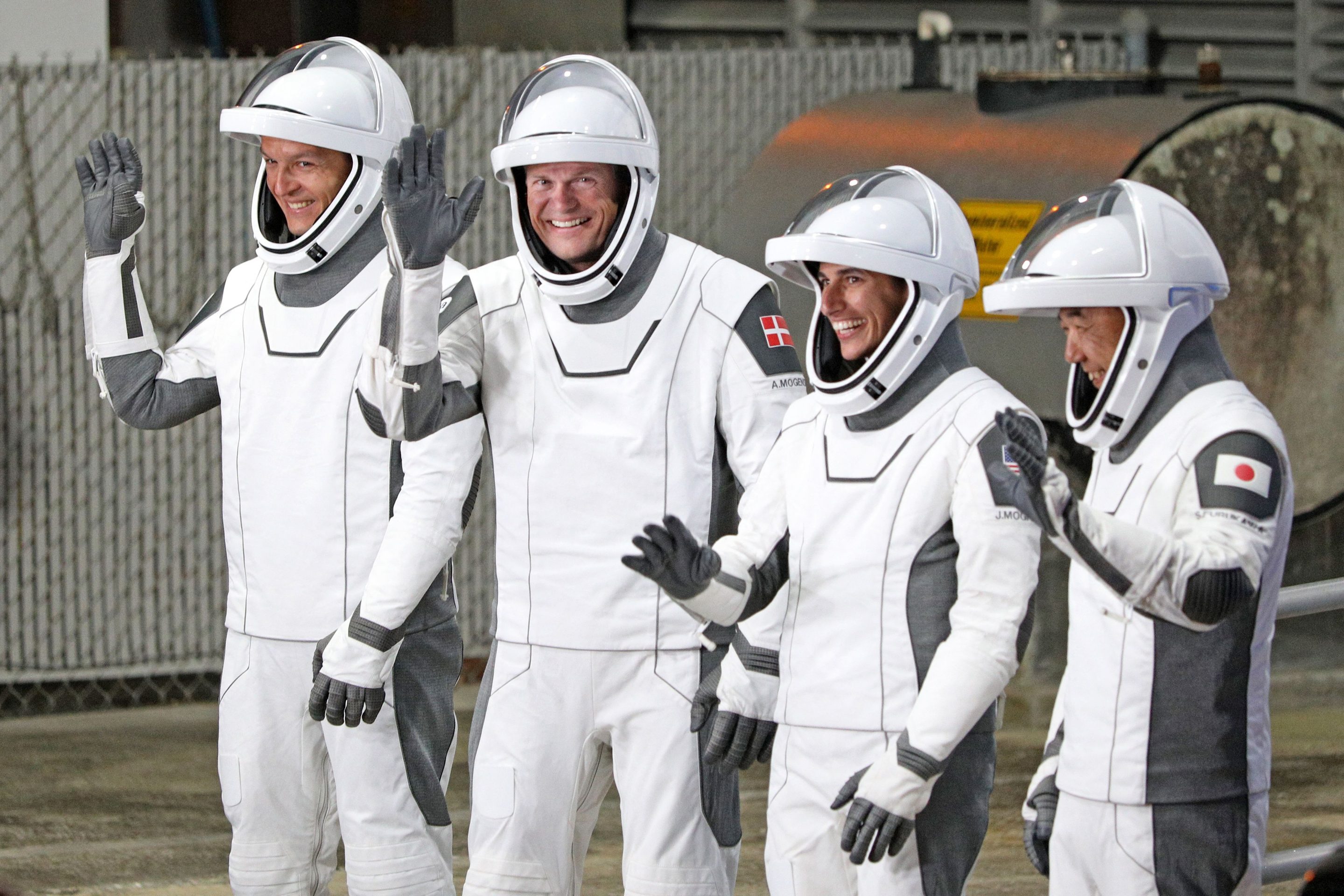 From left, astronauts Konstantin Borisov, Andreas Mogensen, Jasmin Moghbeli, and Satoshi Furukawa wave as they prepare to board the SpaceX Dragon spacecraft for the Crew-7 mission launch, at NASA's Kennedy Space Center in Florida on Saturday.