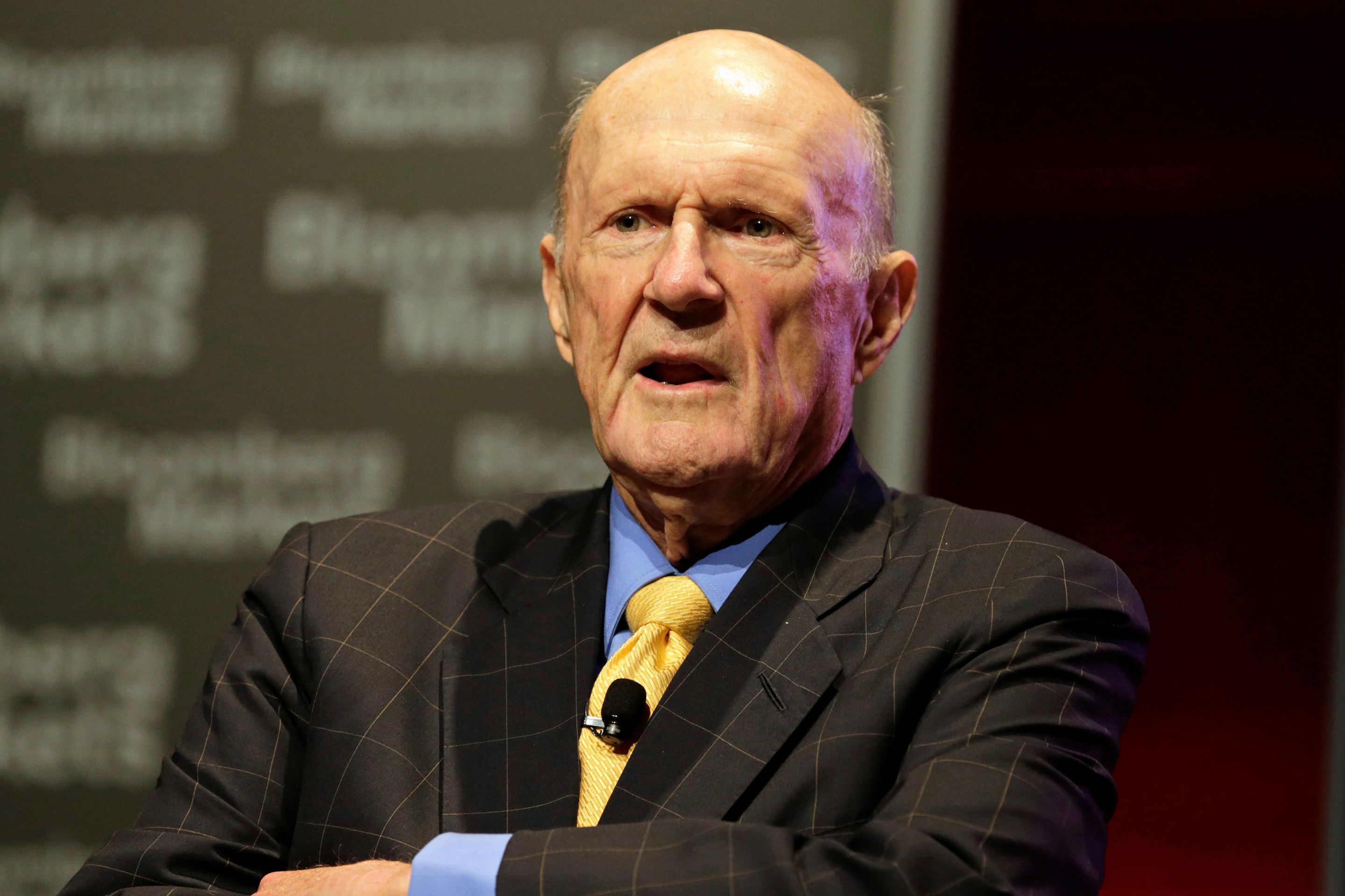elderly man in suit and tie