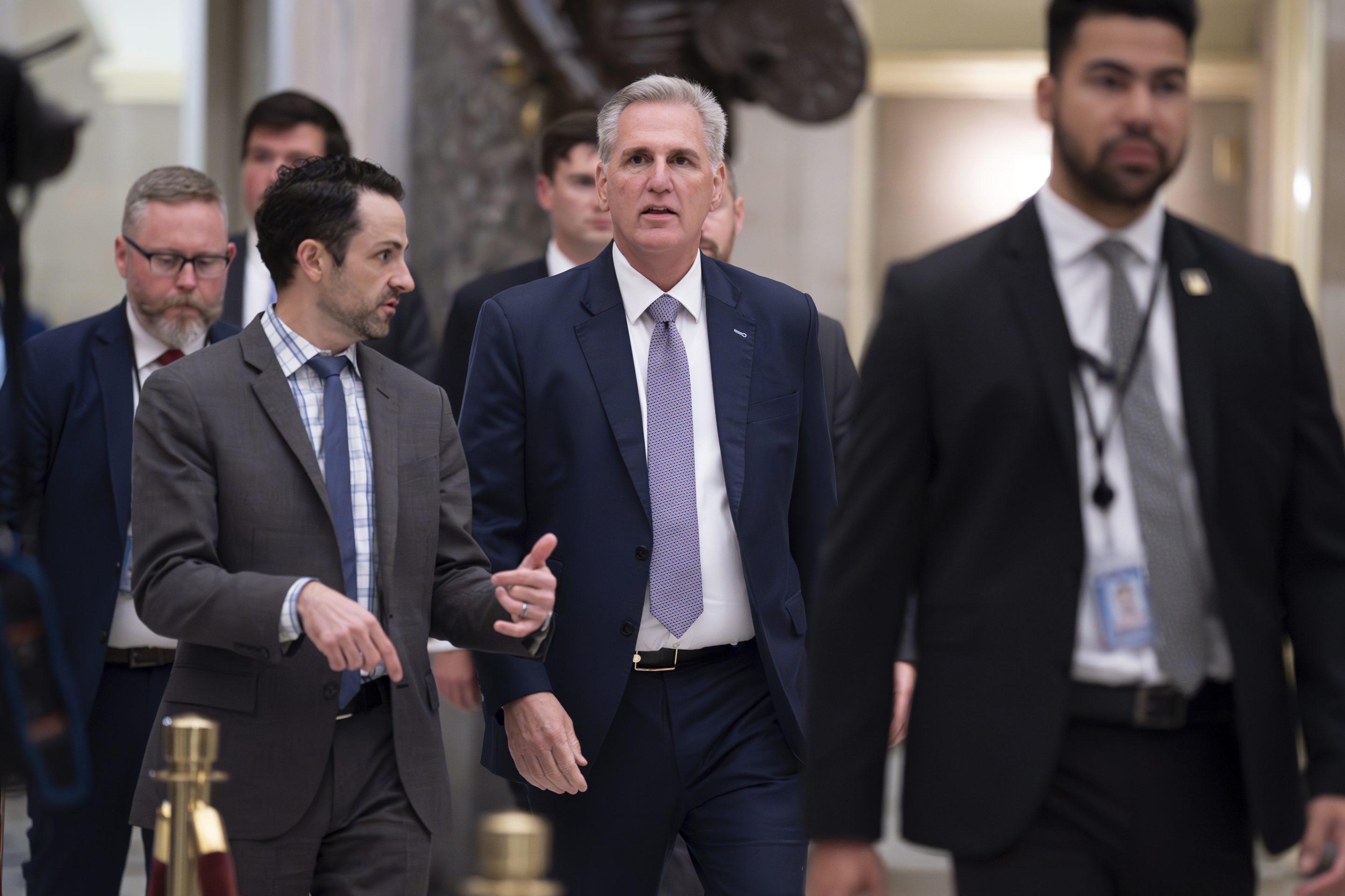 House Speaker Kevin McCarthy, R-Calif., walks to the chamber for procedural votes to advance appropriations bills, at the Capitol in Washington, Tuesday night, Sept. 26, 2023. 
