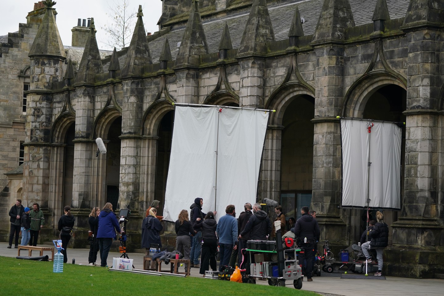 Cast and crew members can be seen on set on Mar. 17 as they film scenes for the next season of The Crown in St Andrews, Scotland. 