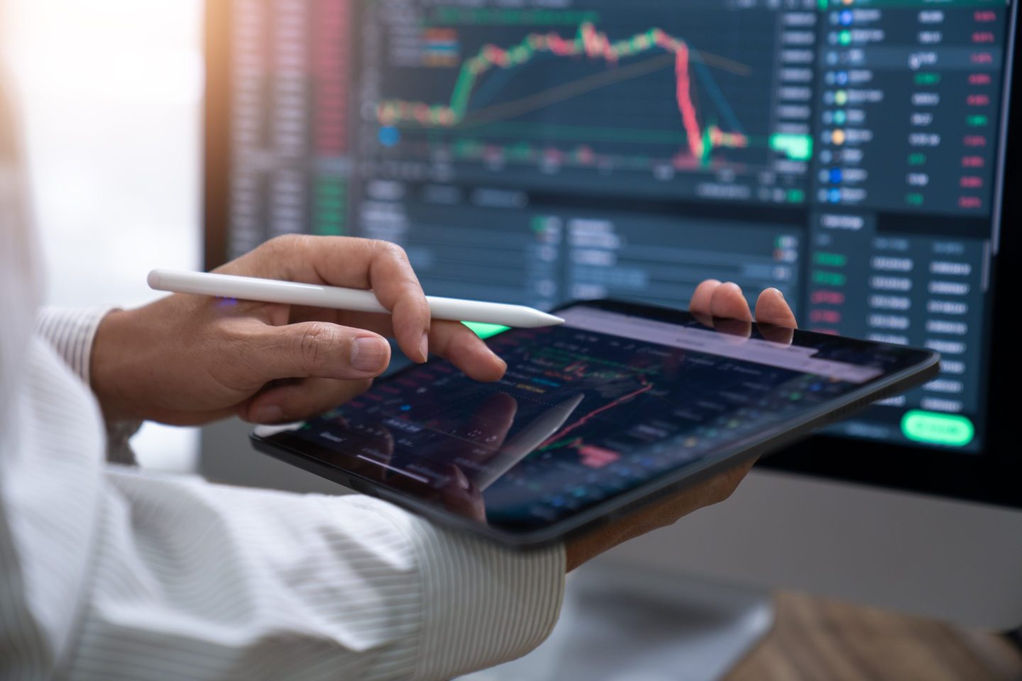 Business Investor buying stock ,cryptocurrency, bitcoin, through mobile app