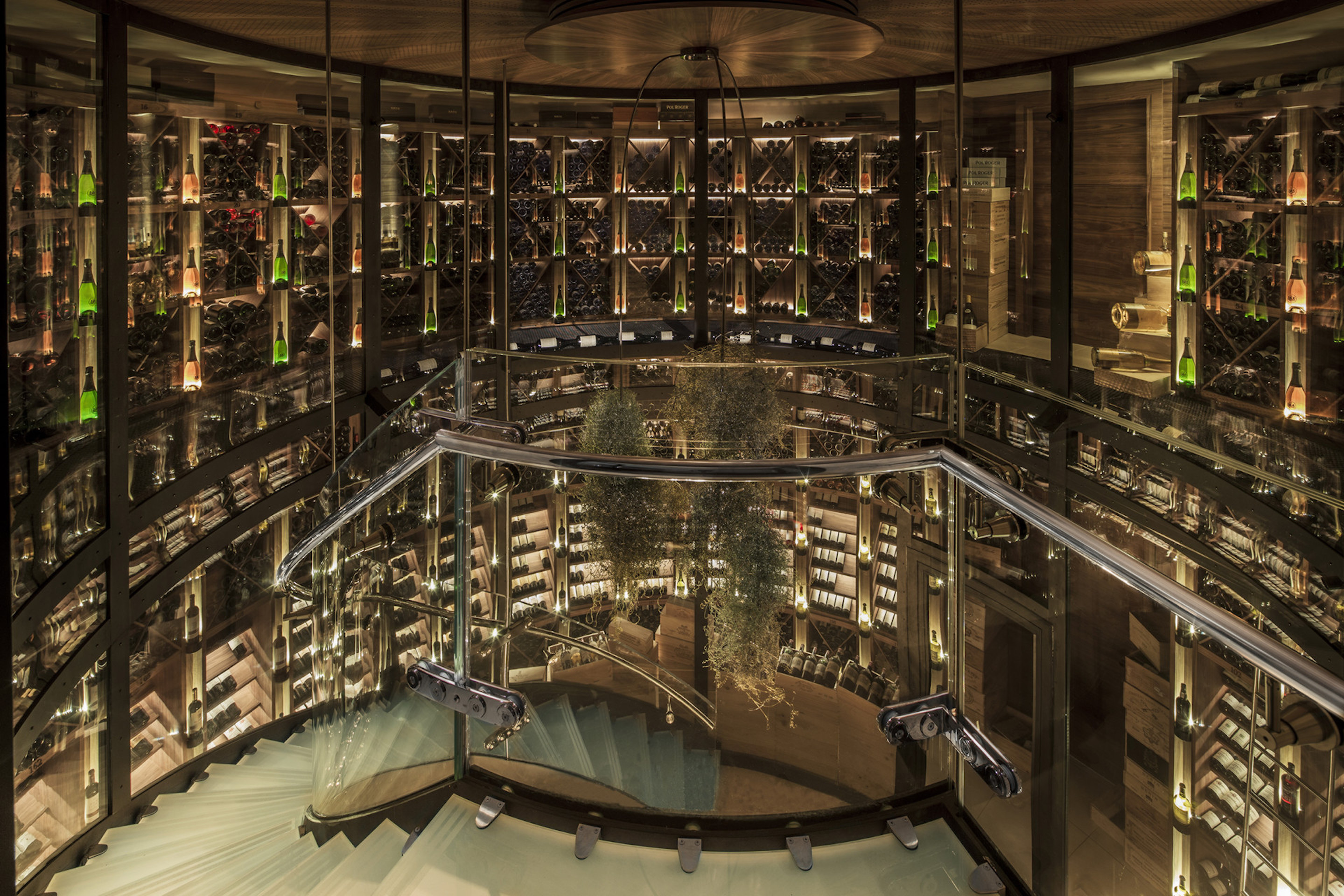 The subterranean wine cellar showcases more than 15,000 bottles of the finest wines from France and beyond.