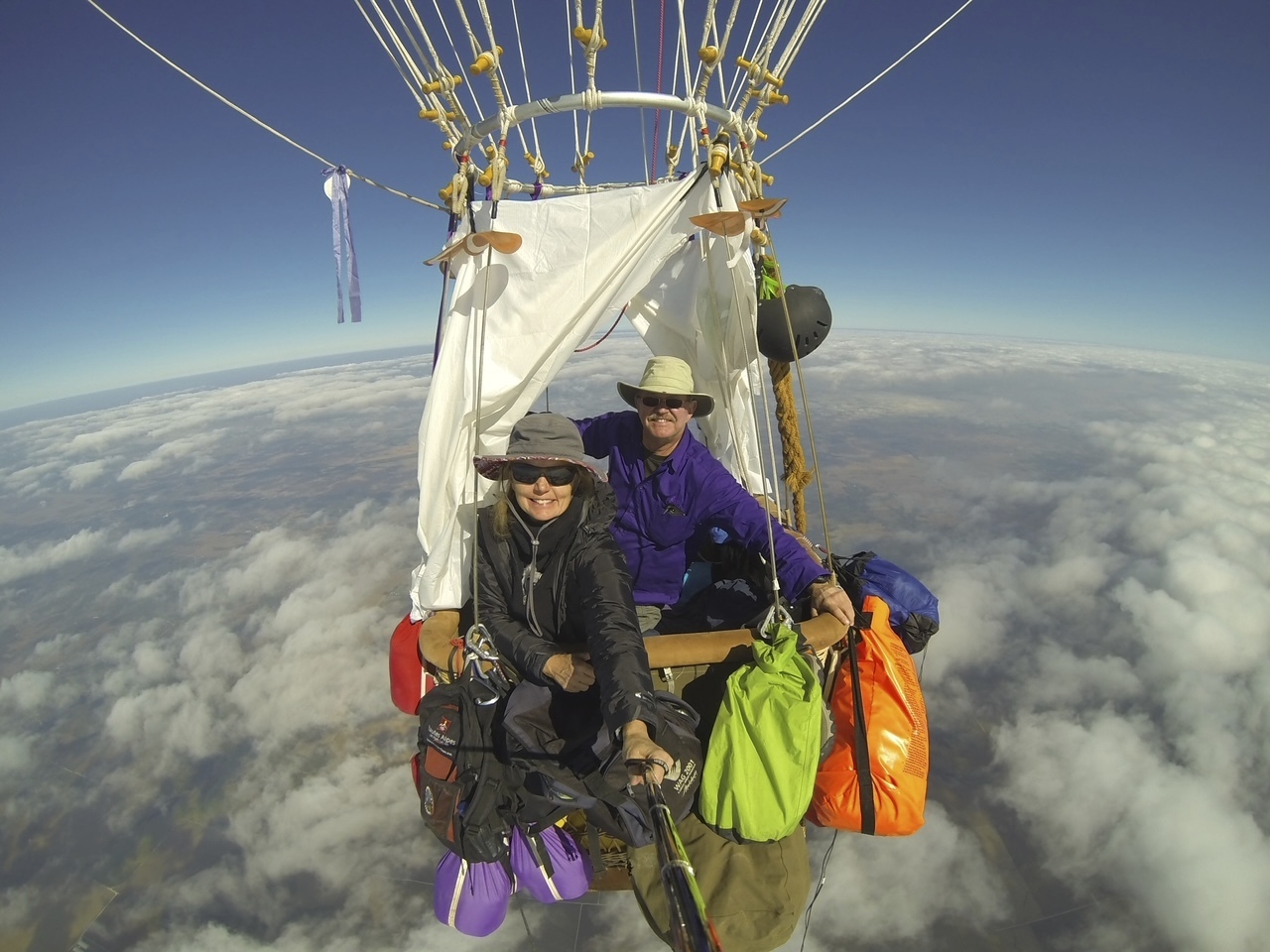 This Oct. 9, 2017 image provided by Cheri White shows Cheri White and pilot Mark Sullivan flying their gas balloon during a long-distance competition.