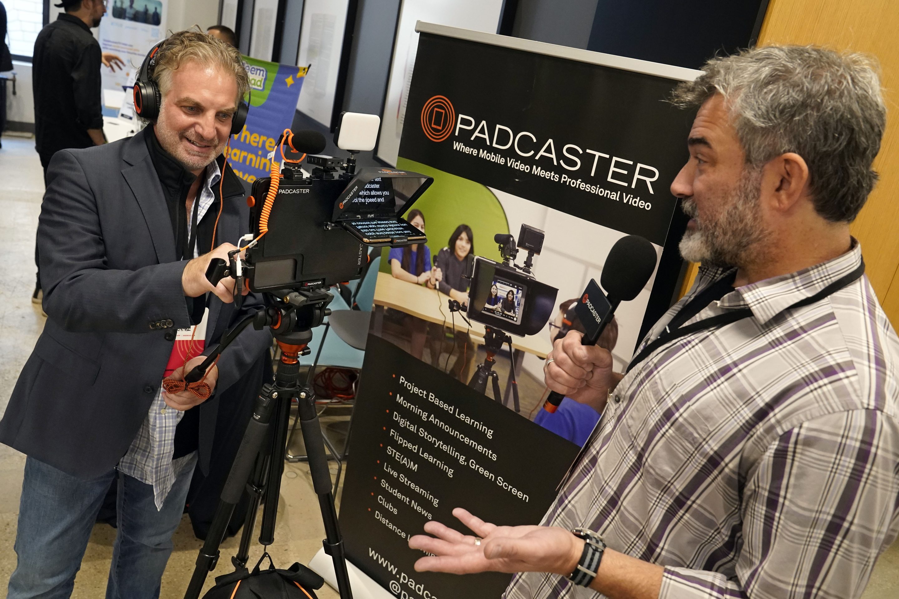 Padcaster president Jon Goldberg, left, and CEO Josh Apter, demonstrate their Padcaster Studio for remote and virtual learning, at EDTECHWEEK 2023, in New York, on Oct. 3, 2023. 