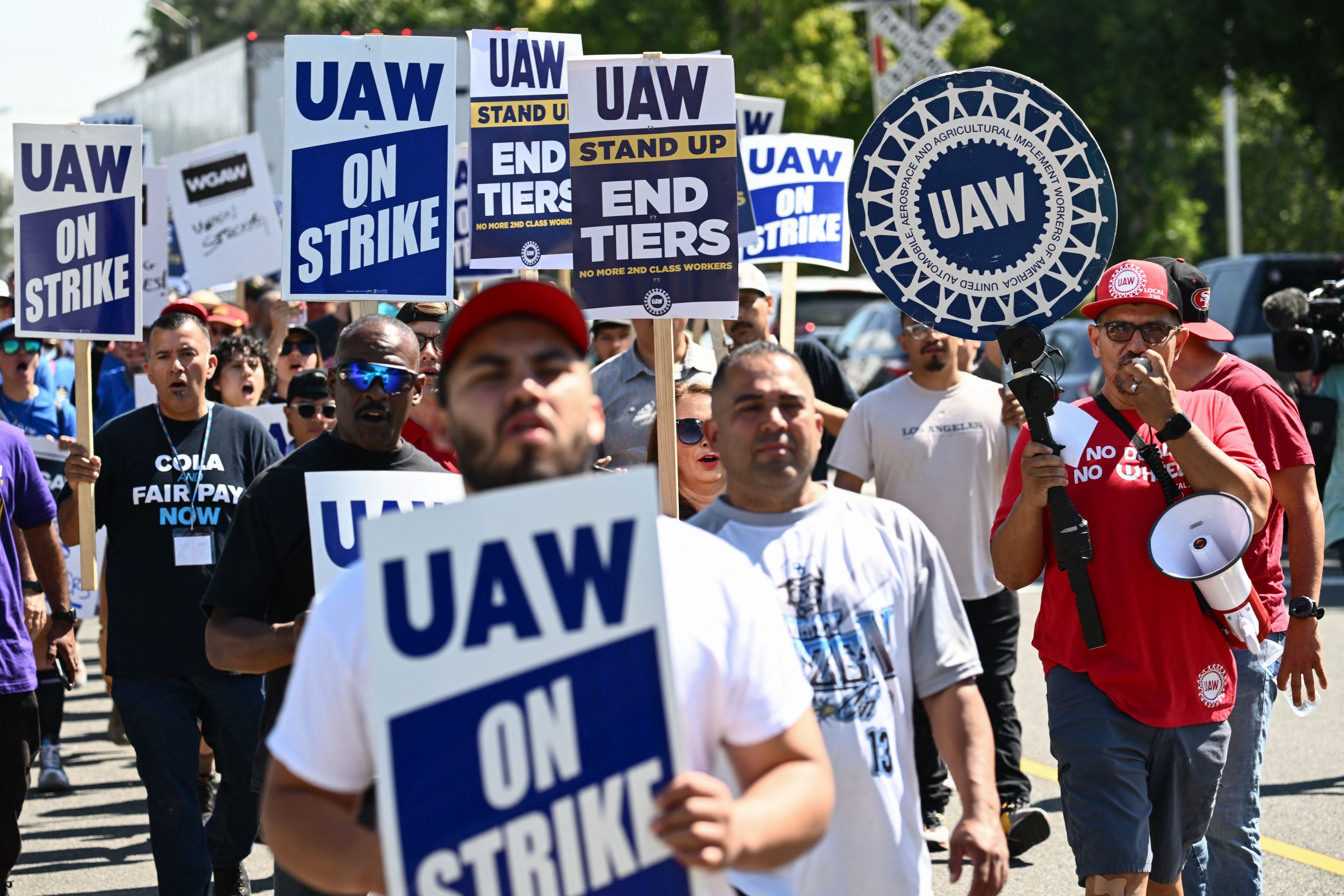 Members of the United Auto Workers and their supporters walking the picket line recently.