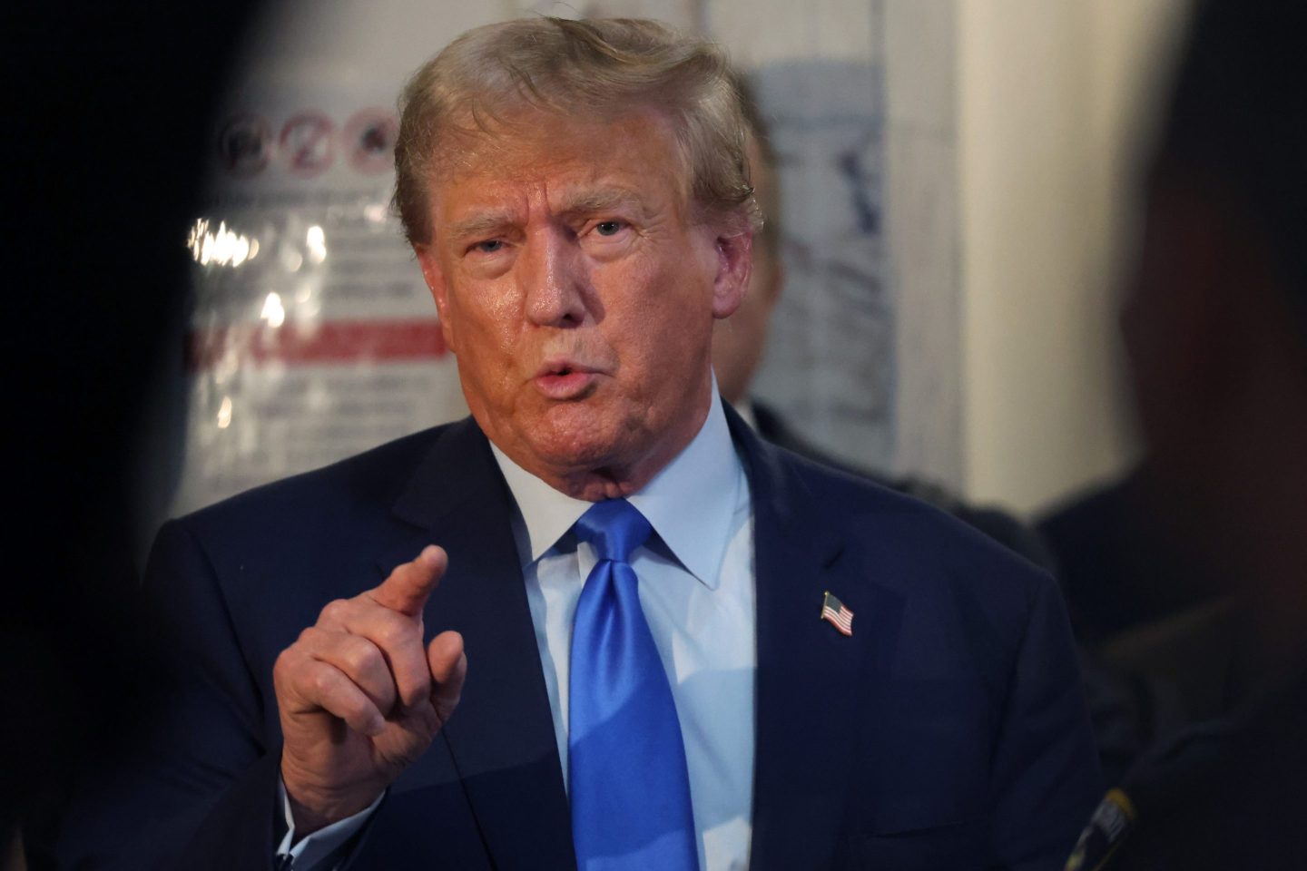 Former President Donald Trump speaks to the media after leaving a New York State Supreme court after the start of the civil fraud trial against him
