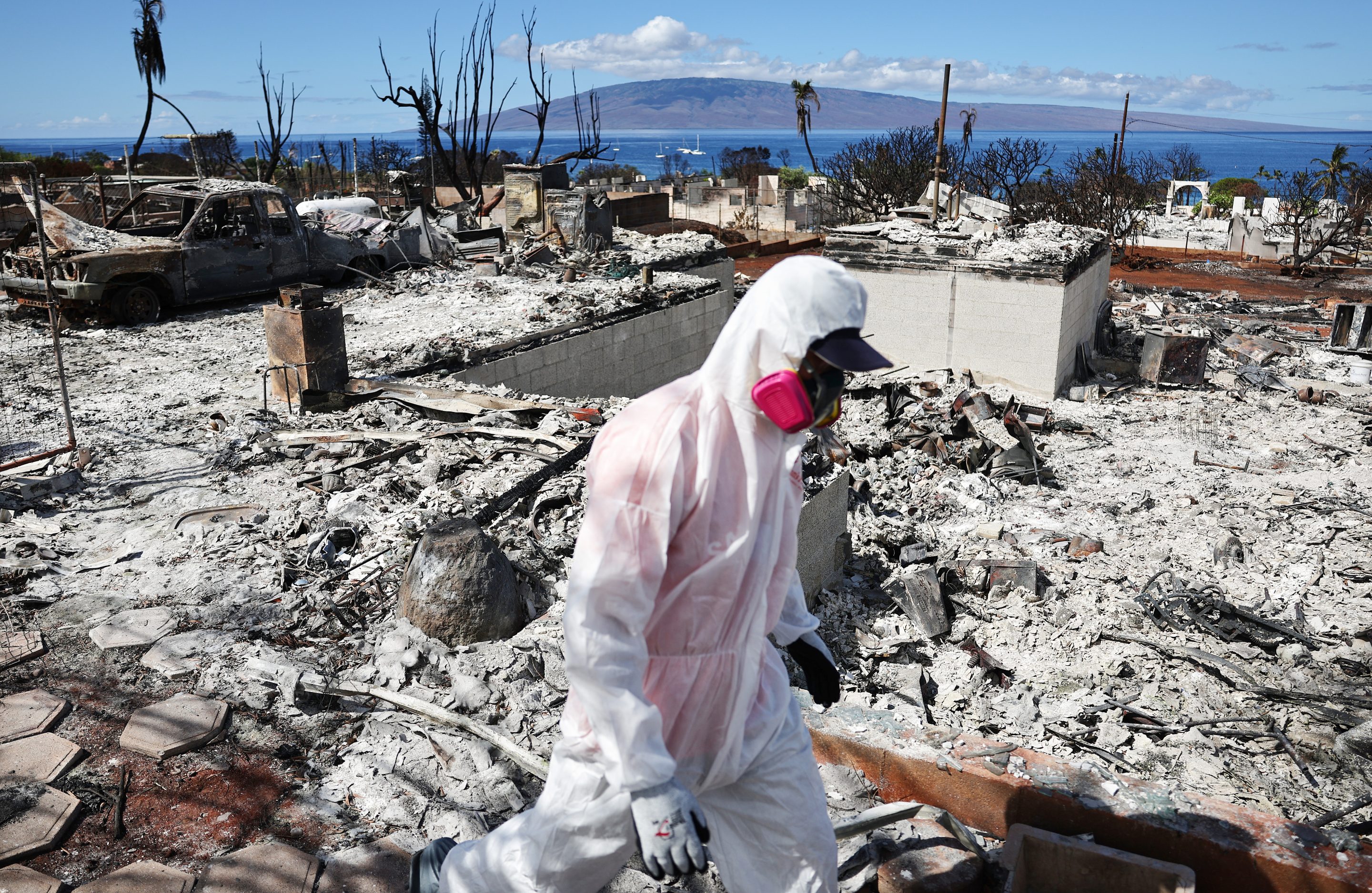 A volunteer searches for family heirlooms on Maui