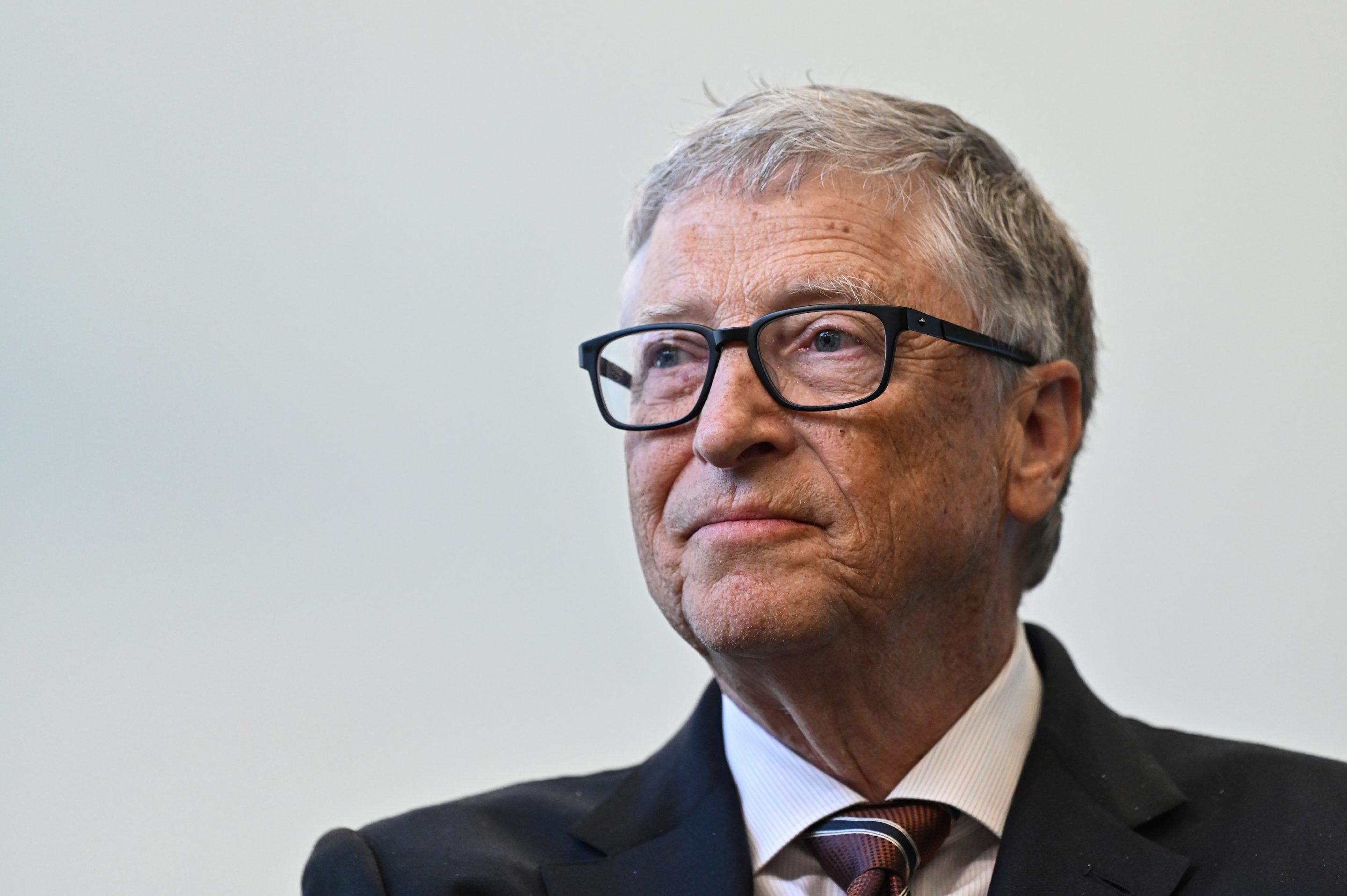 Microsoft founder Bill Gates reacts during a visit with Britain's Prime Minister Rishi Sunak (not pictured) to the Imperial College University on February 15, 2023 in London, England.