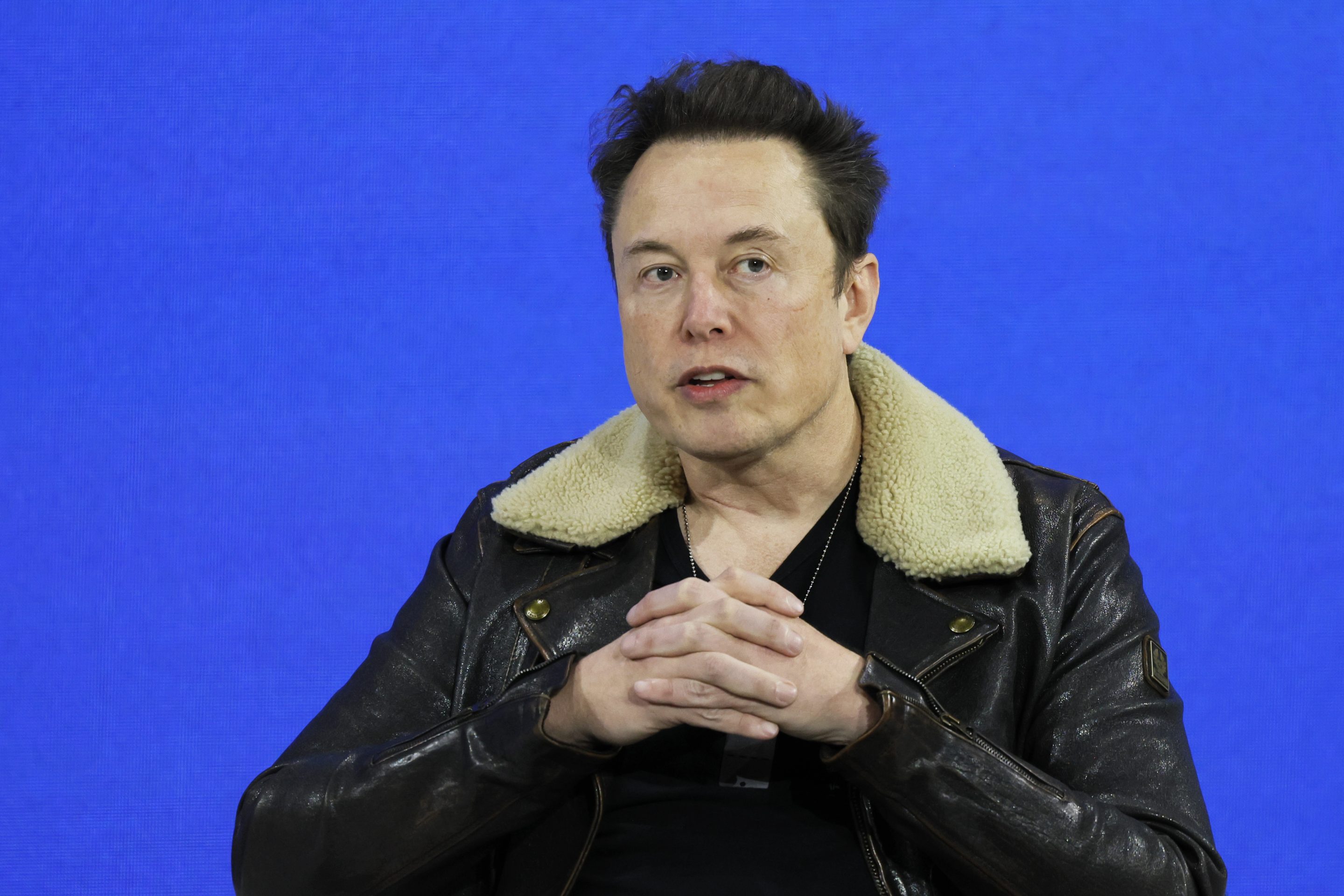 Tesla CEO sees big things ahead for China's electric-vehicle makers. 