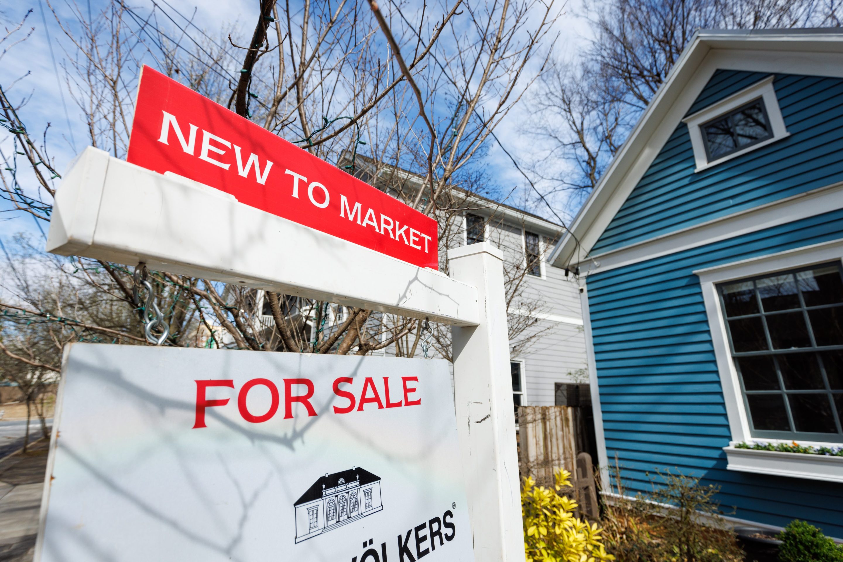 A "For Sale" sign outside a home in Atlanta.