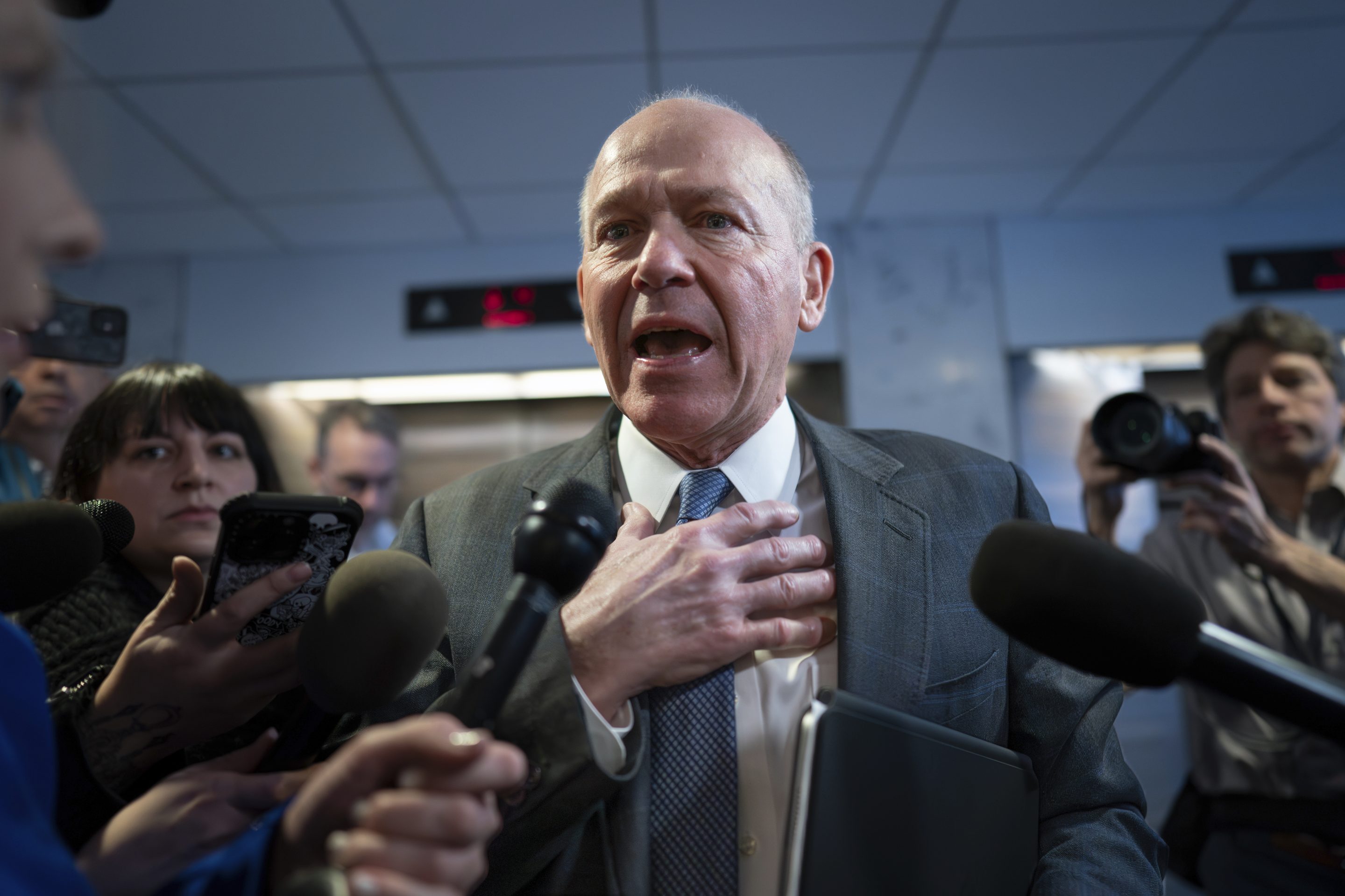 Boeing CEO Dave Calhoun speaks briefly with reporters after a meeting in the office of Sen. Mark Warner, D-Va., at the Capitol in Washington, on Jan. 24, 2024.