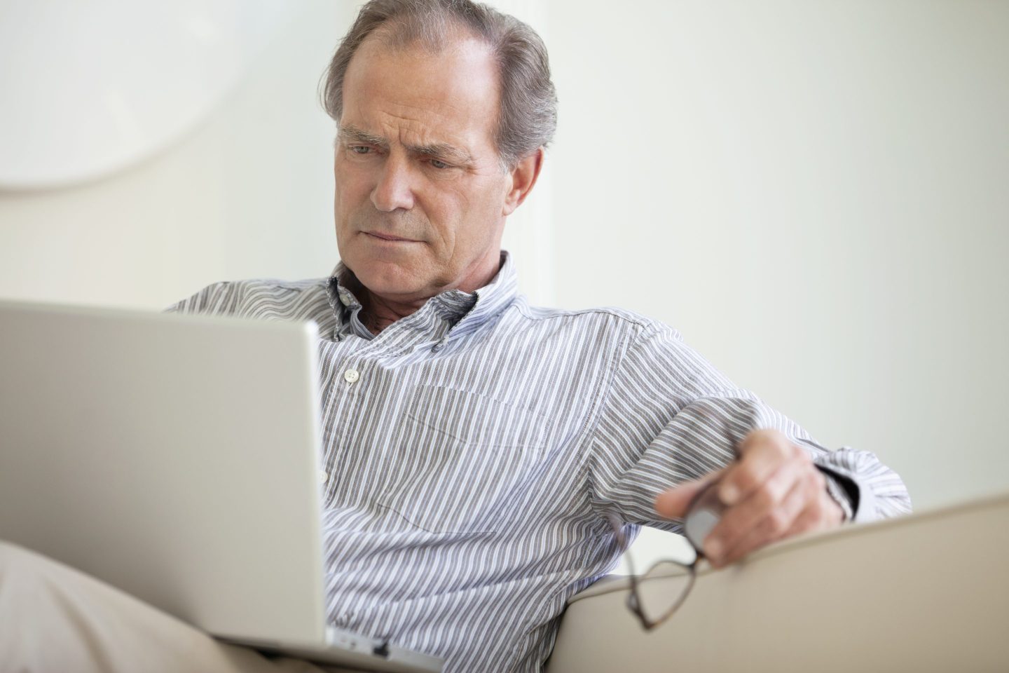 puzzled man at laptop