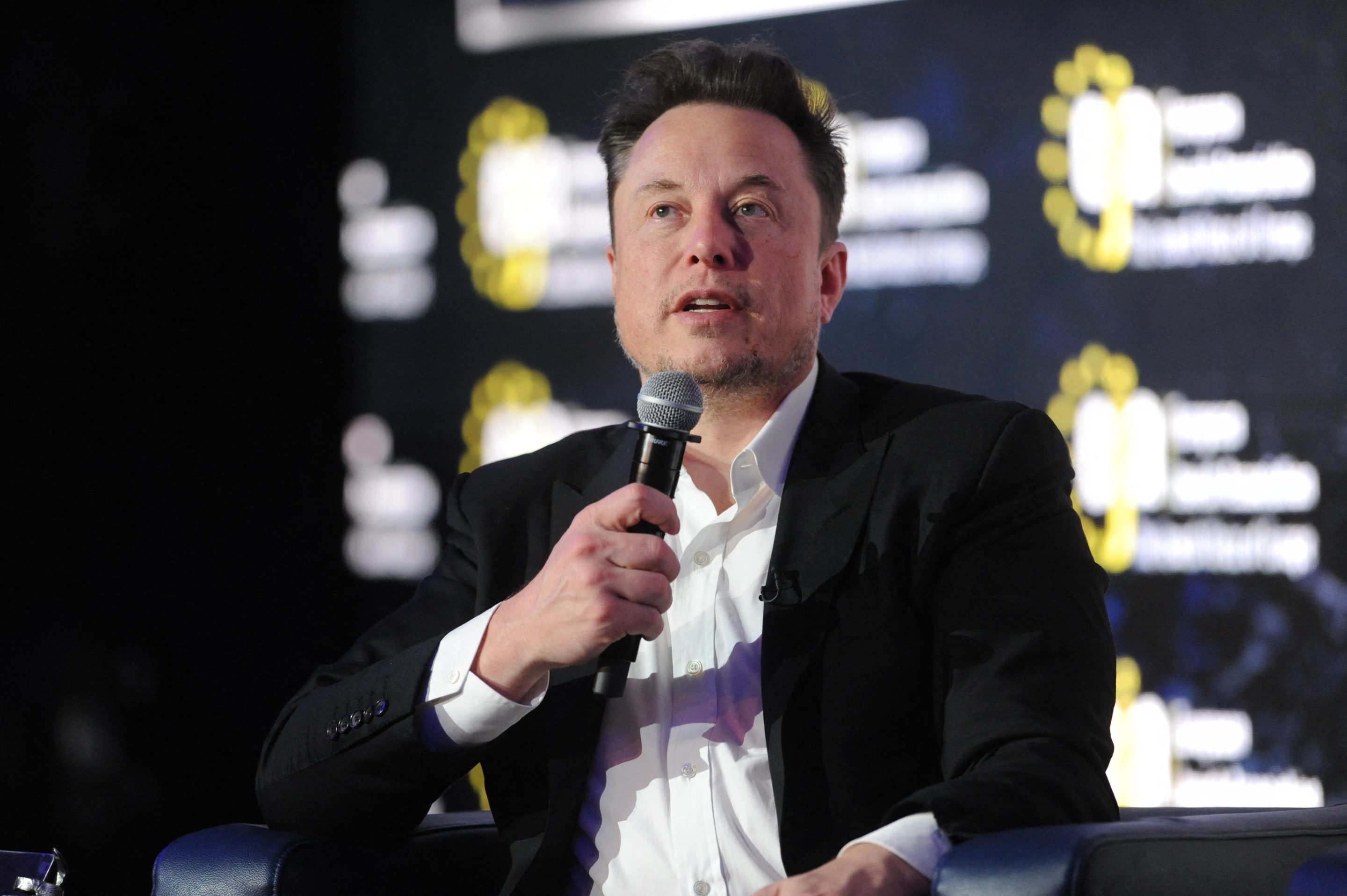SpaceX CEO Elon Musk speaks at an event on combatting antisemitism. SpaceX recently announced a partnership with John Deere.
