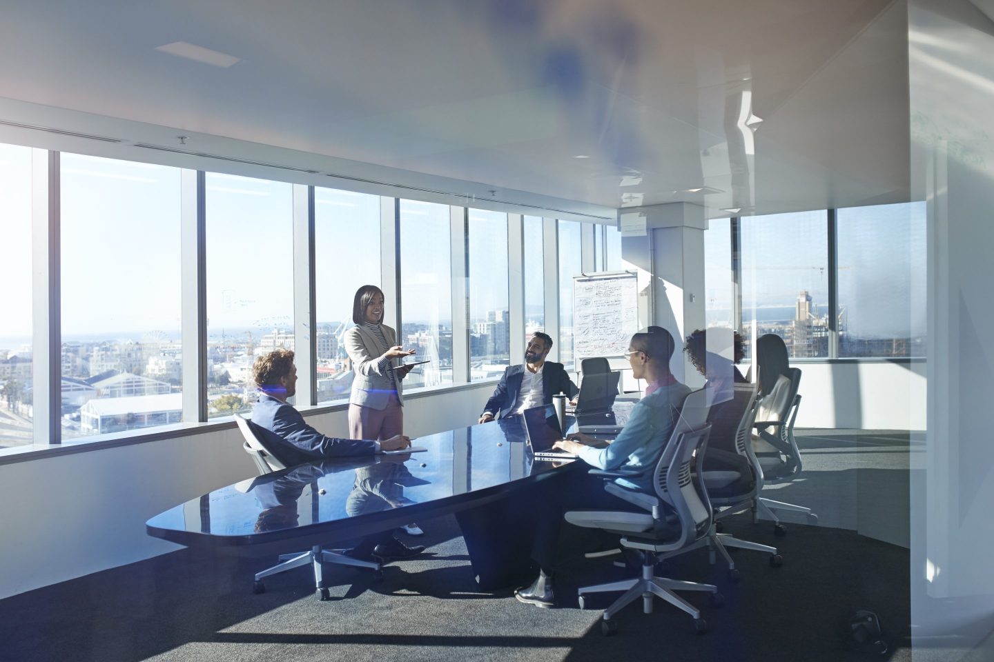 Modern chic business people working in an incredible futuristic &amp; original office space
