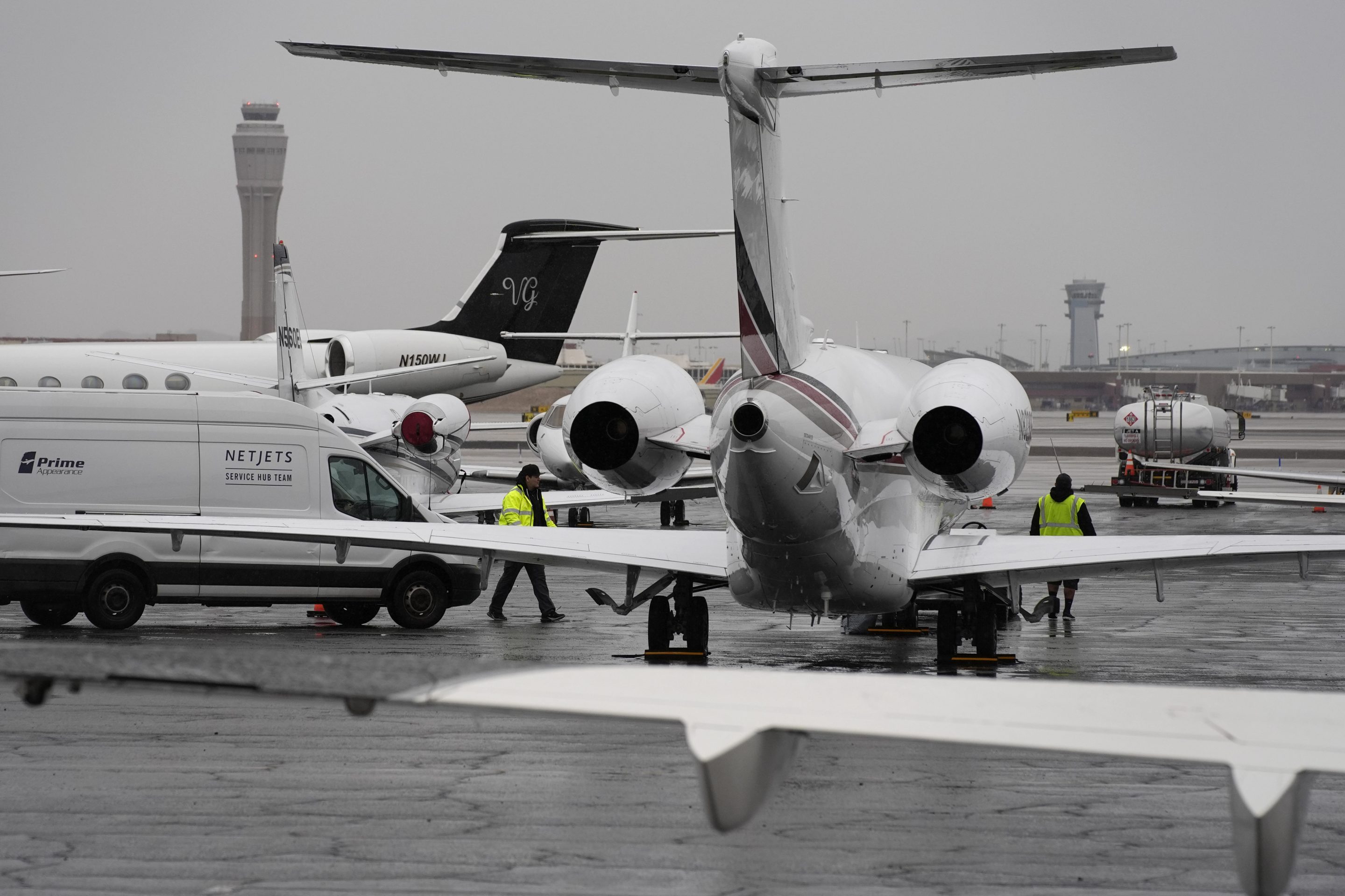 Planes are parked at a private jet terminal at Harry Reid International Airport ahead of the Super Bowl,on Feb. 1, 2024, in Las Vegas.