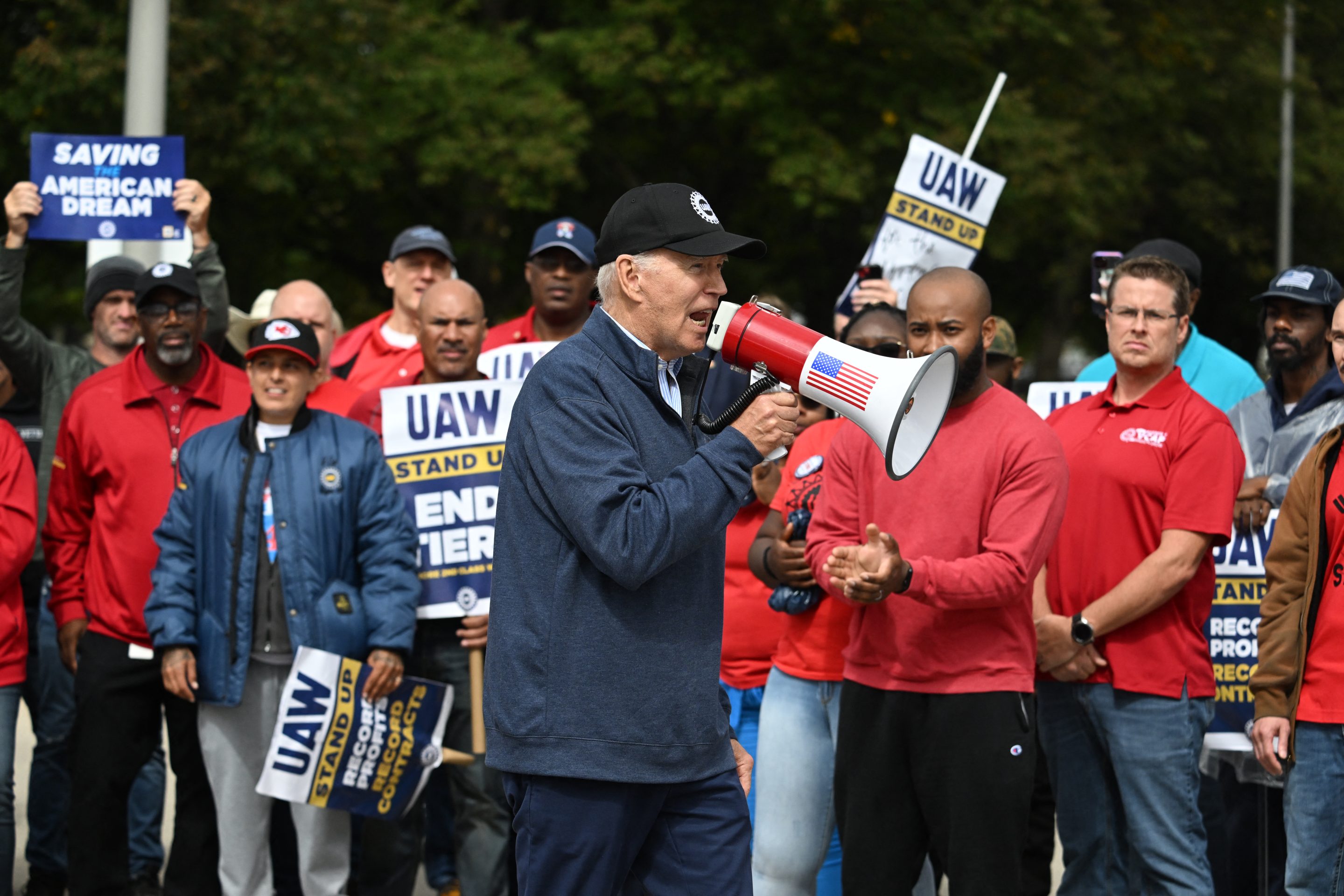 President Joe Biden addresses striking members of the United Auto Workers (UAW) union at a picket line outside a General Motors Service Parts Operations plant in Belleville, Michigan, on Sep. 26.