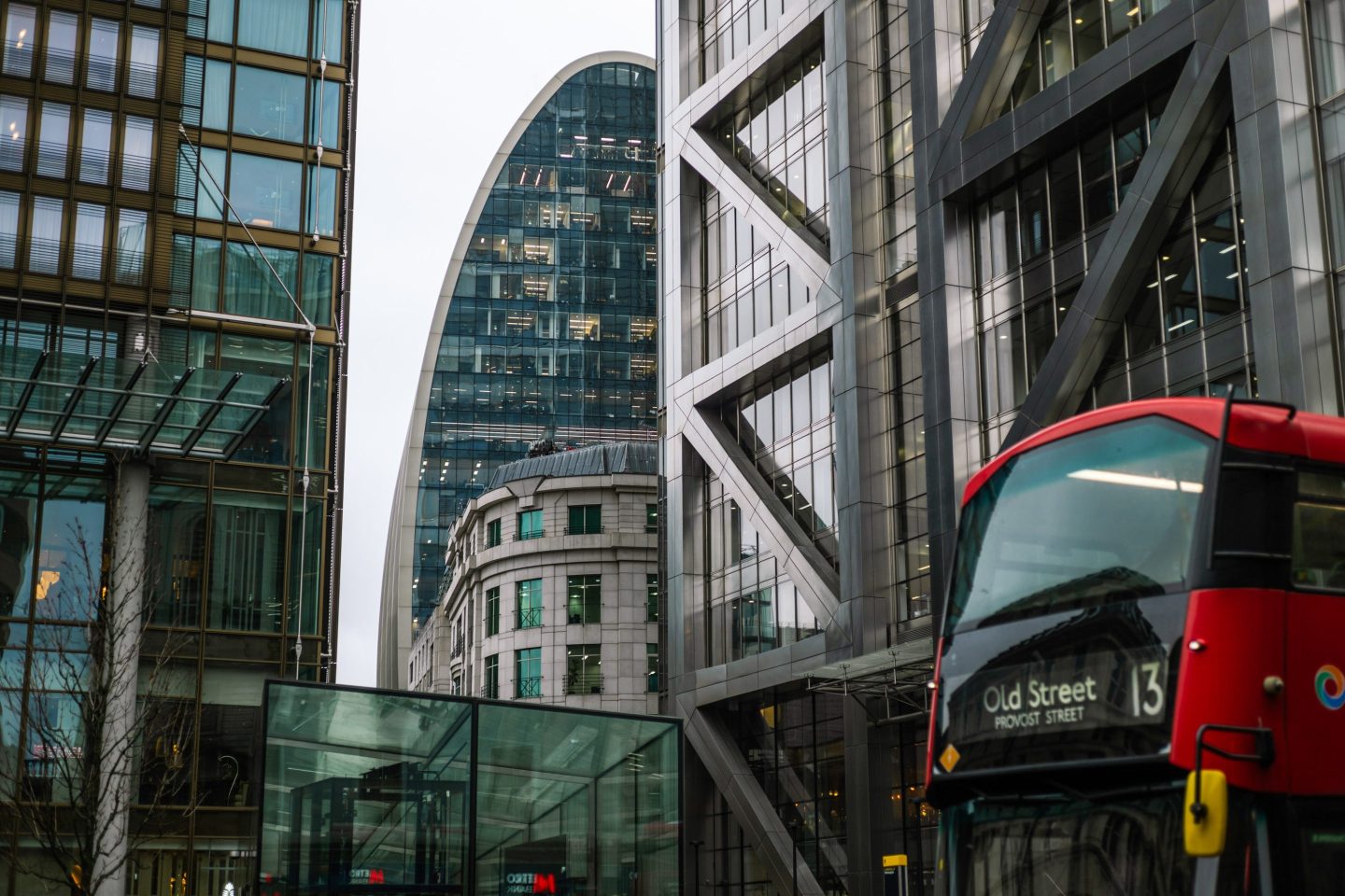 A bus passes Liverpool Street railway station in Canada, UK.