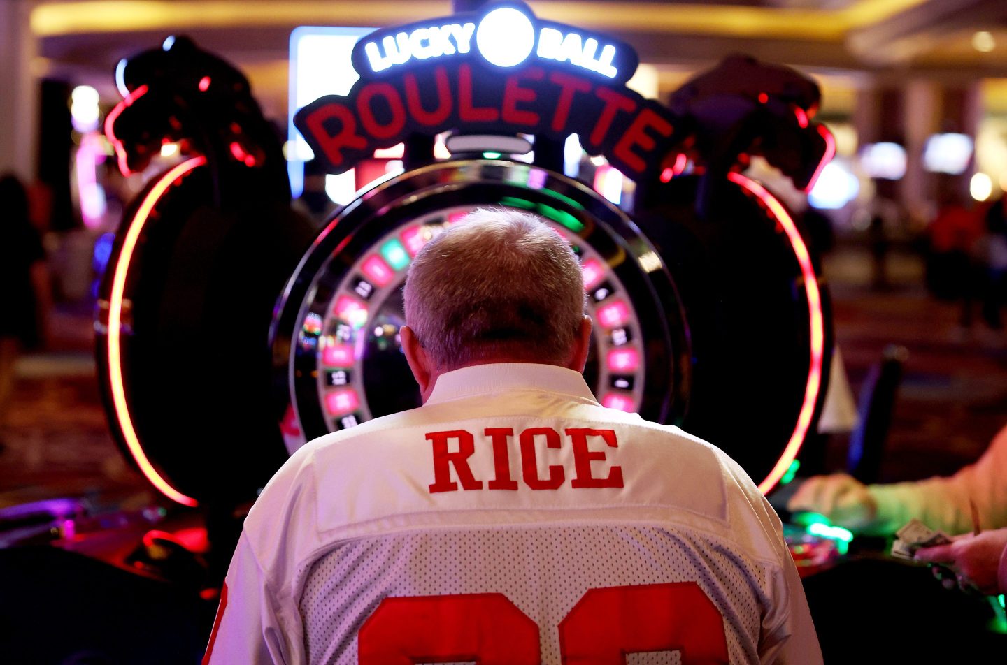Poker player at slot machine