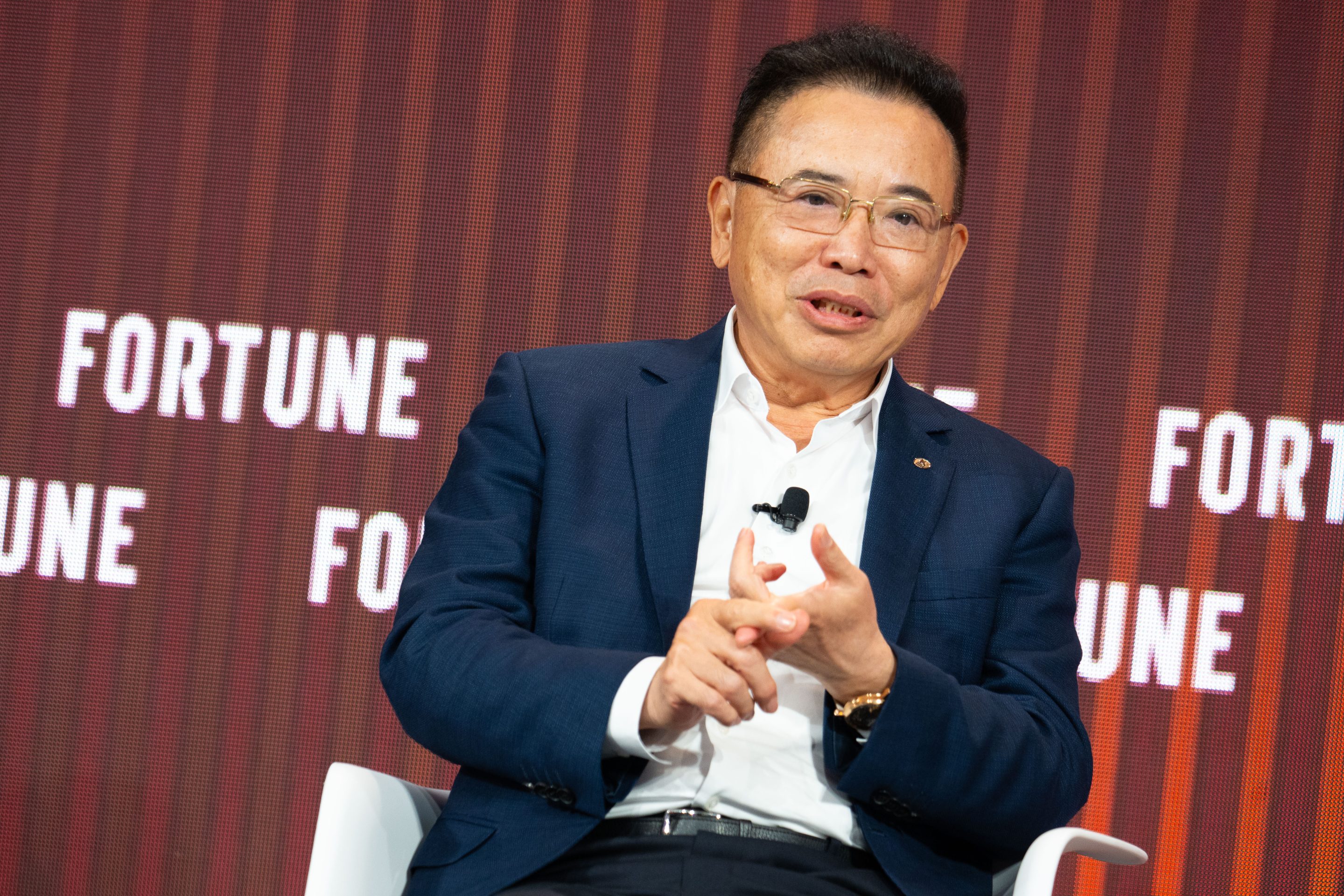 Dongsheng Li speaking at the Fortune Innovation Forum in Hong Kong on March 27, 2024.