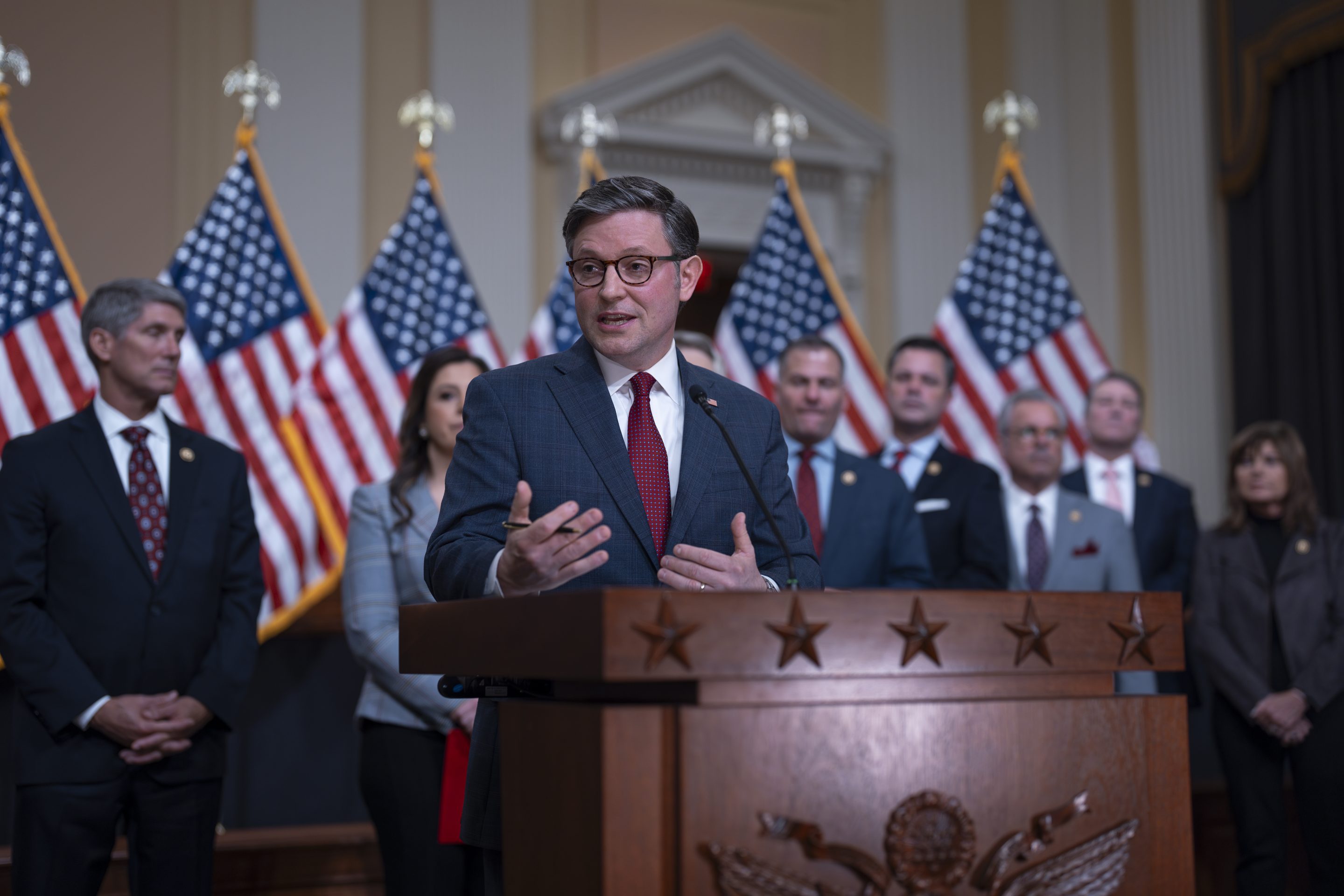 Speaker of the House Mike Johnson, R-La., joined by fellow Republicans, speaks during a news conference at the Capitol in Washington, on March 6, 2024. 