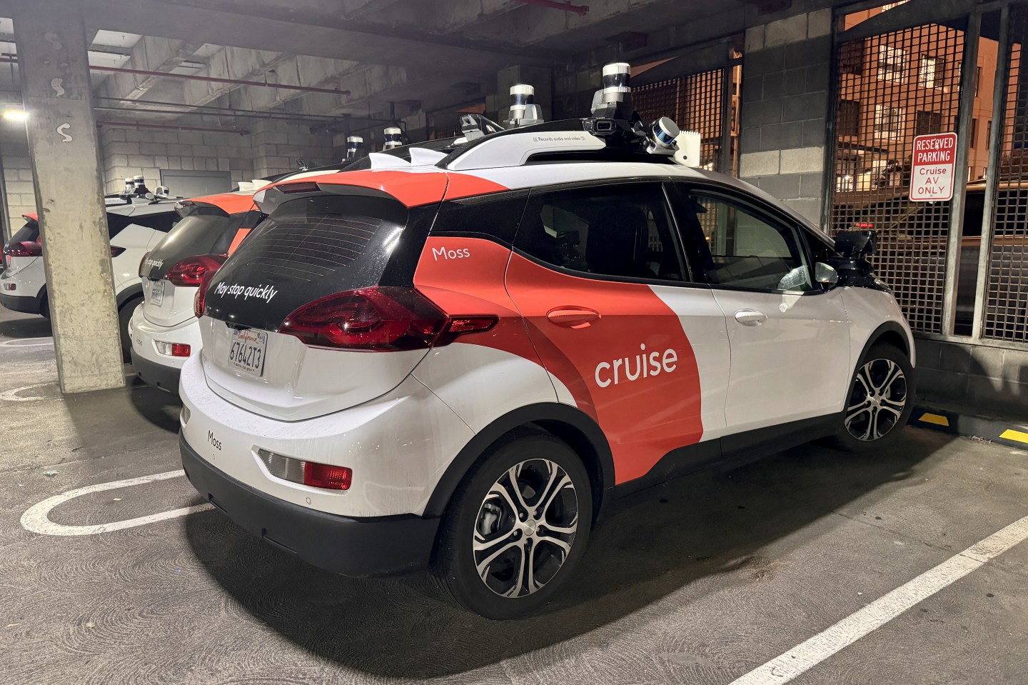 General Motors has sliced Cruise’s budget by $1B, but says it may bring on new Cruise investors when it starts rolling robo-taxis back on the streets