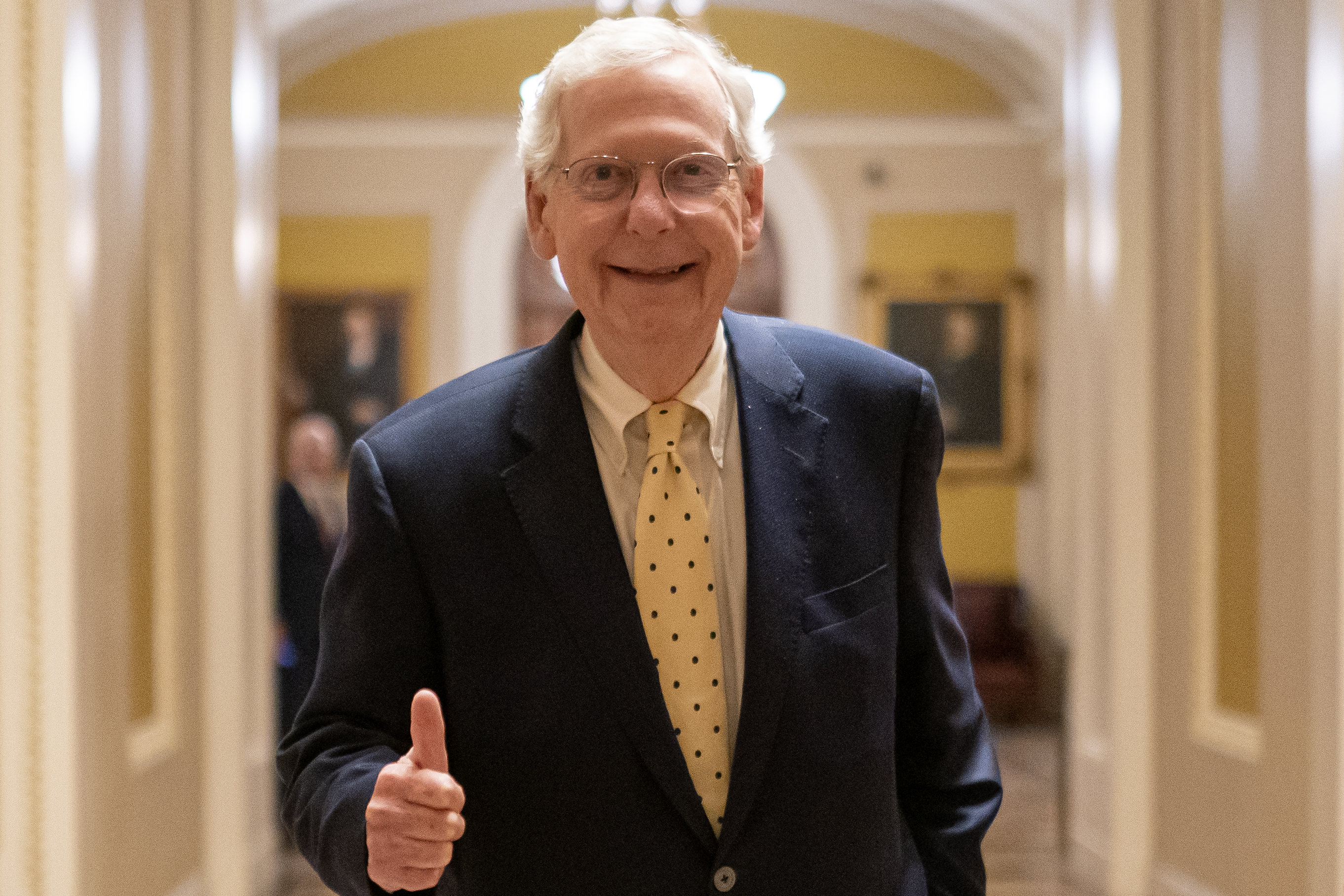 Senate Minority Leader Sen. Mitch McConnell (R-KY) departs the Senate Chambers on March 23, 2024 in Washington, DC.