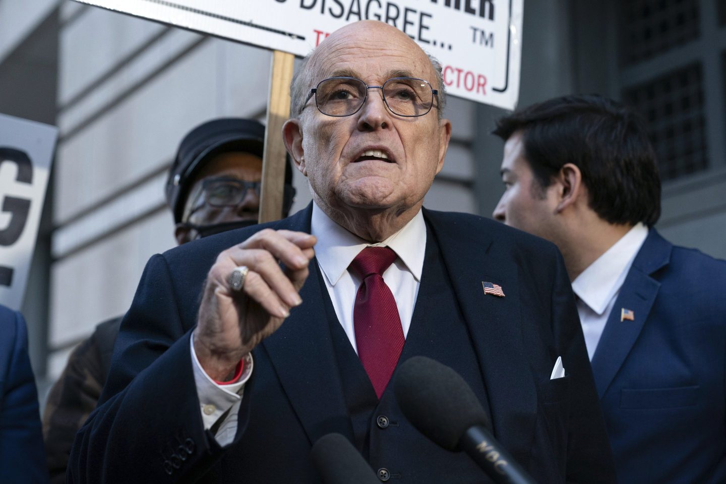 Rudy Giuliani speaks before microphone