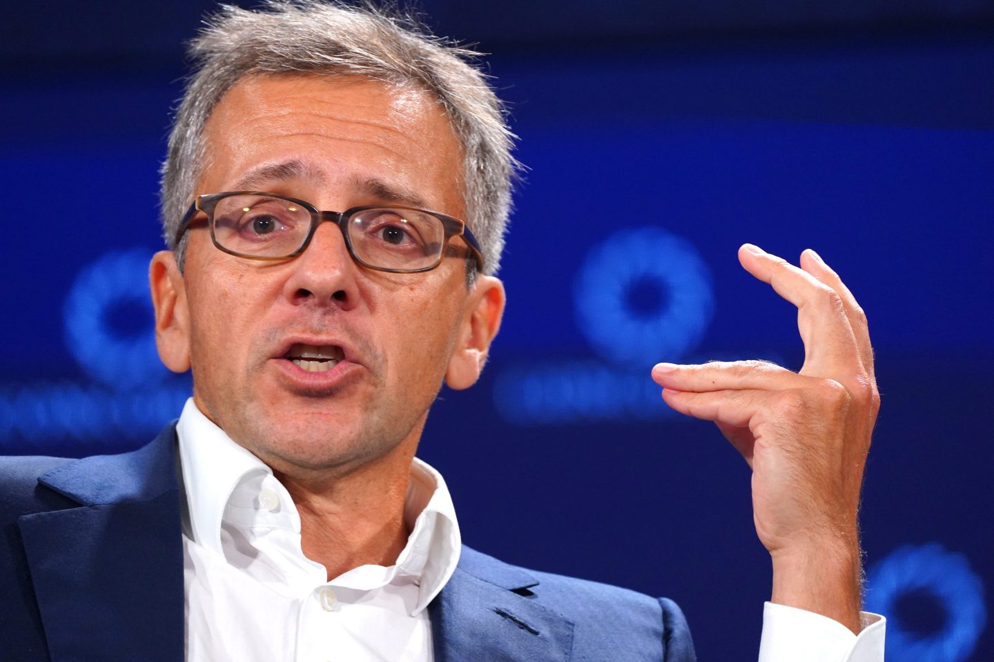 Dr. Ian Bremmer, President of Eurasia Group &amp; GZERO Media, speaks on stage at a conference.