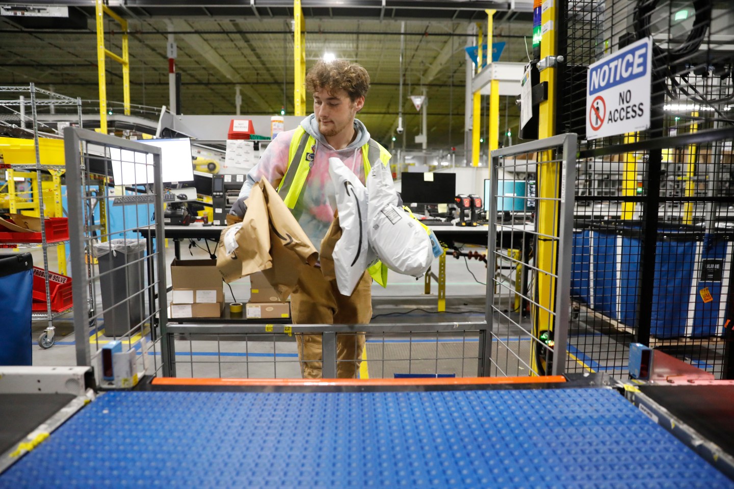Amazon raised warehouse wages to $15 an hour 5 years ago. Today, half of workers surveyed told researchers they struggle to afford  food or rent