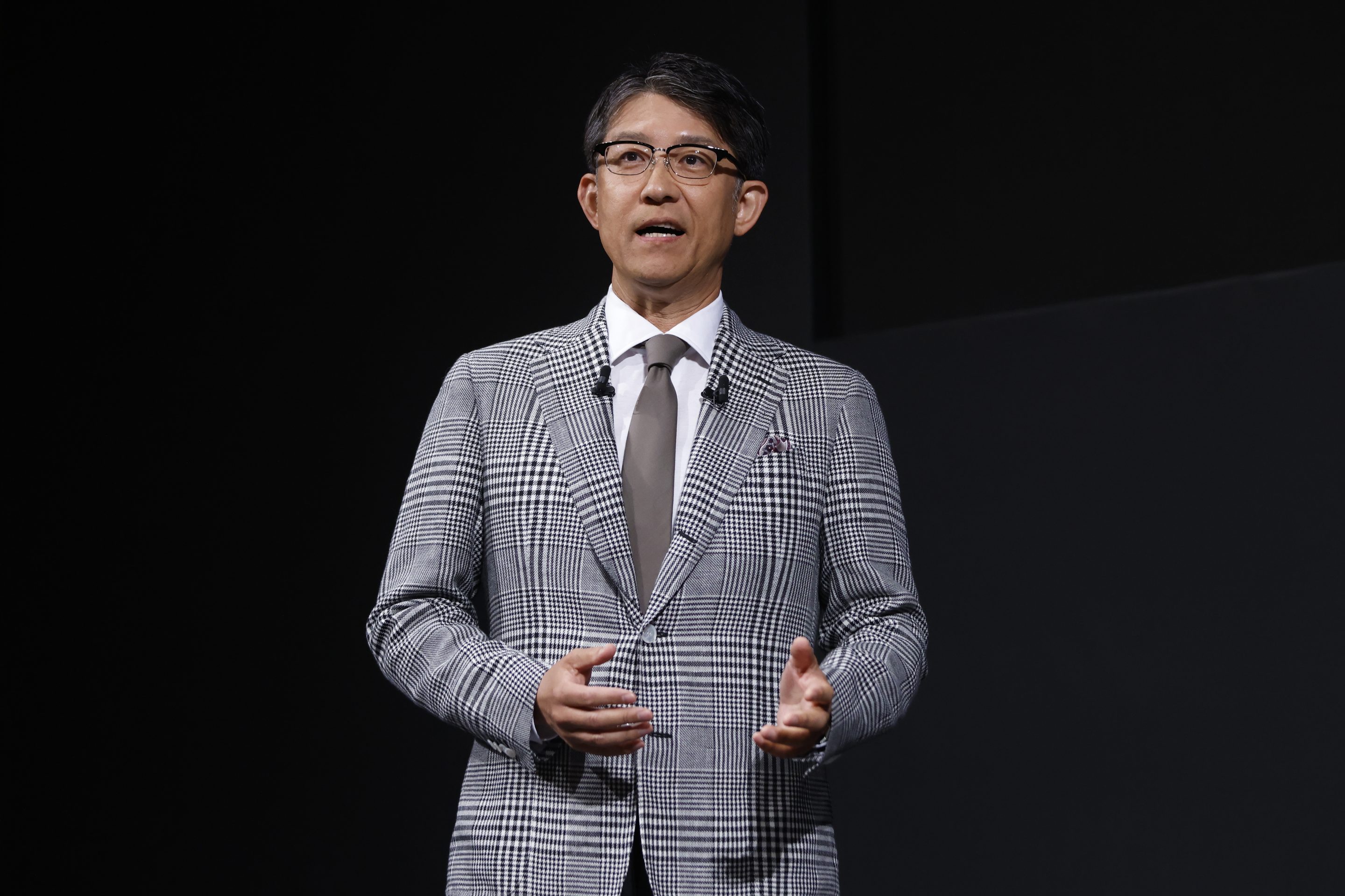 Koji Sato, CEO of Toyota, joined the CEOs of Subaru and Mazda in a press conference announcing new combustion engines.