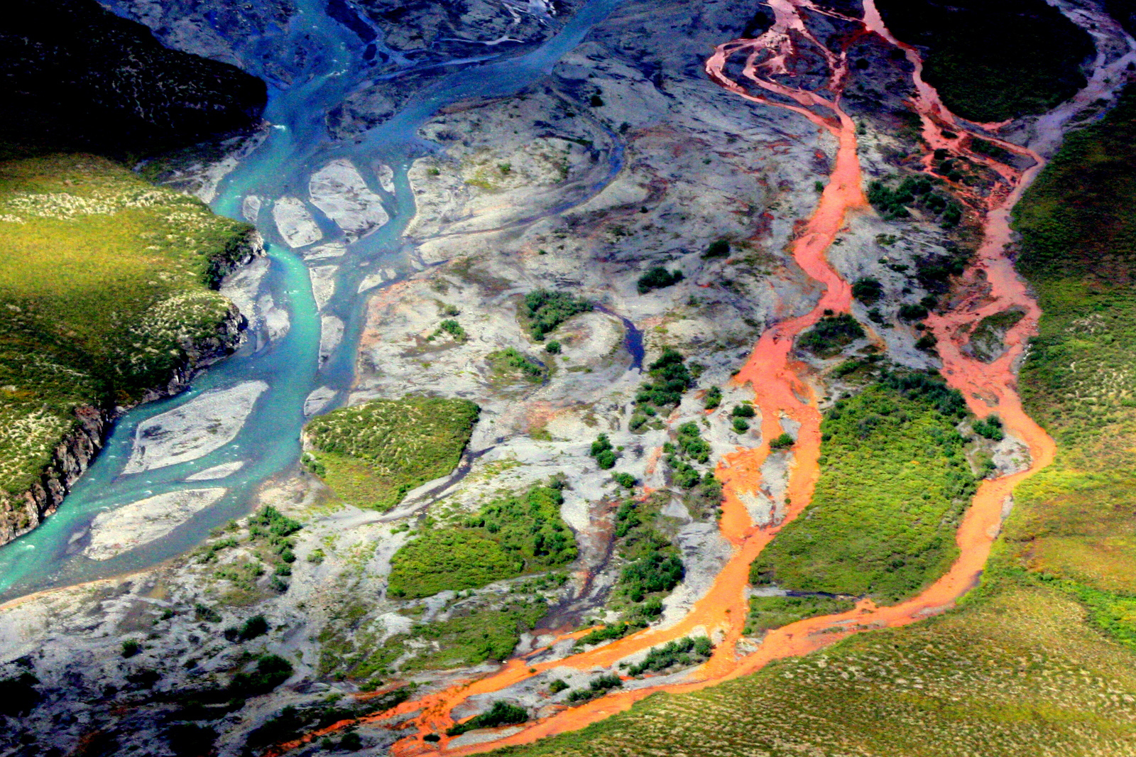An aerial view of the rust-colored Kutuk River in Gates of the Arctic National Park in Alaska.