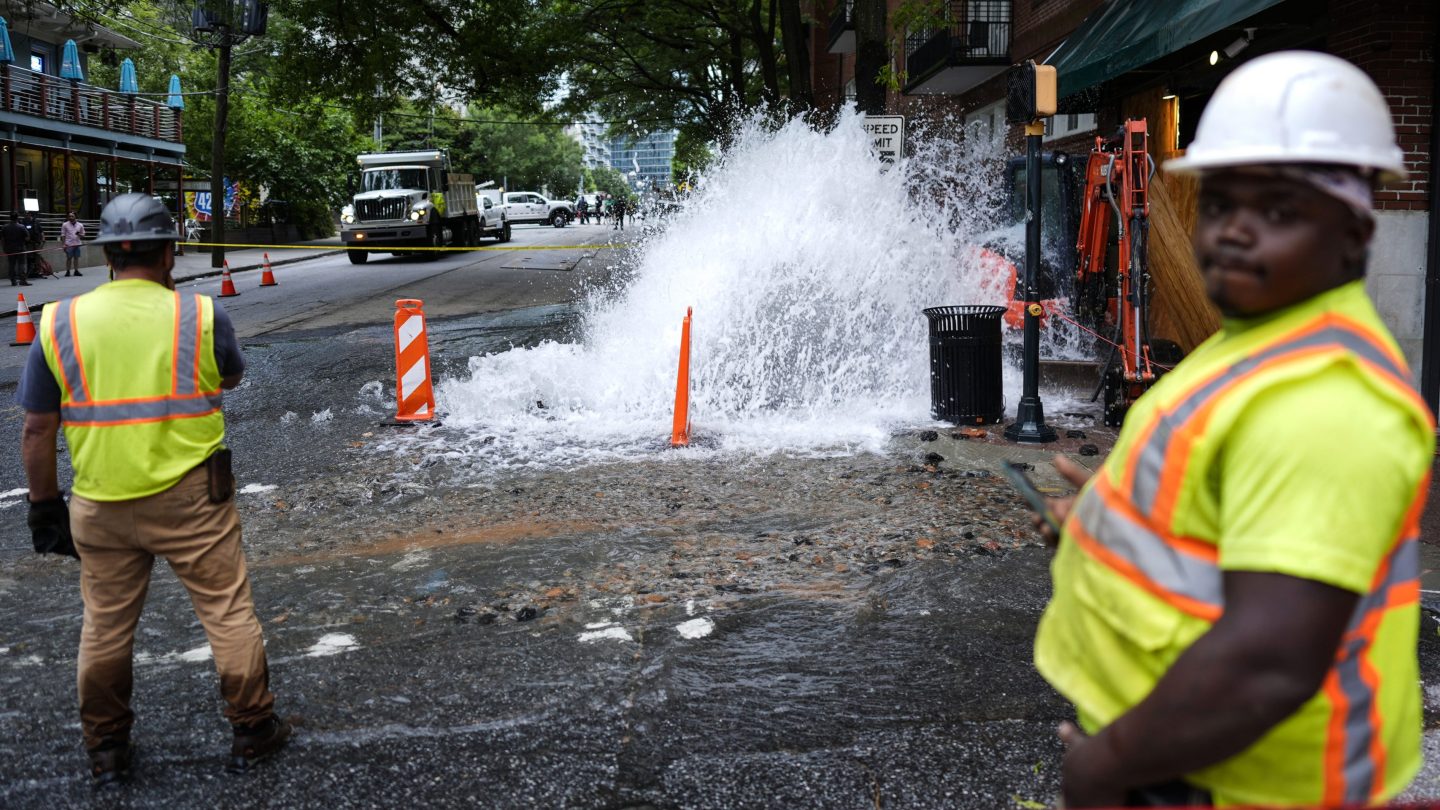 A gushing water pipe in the street