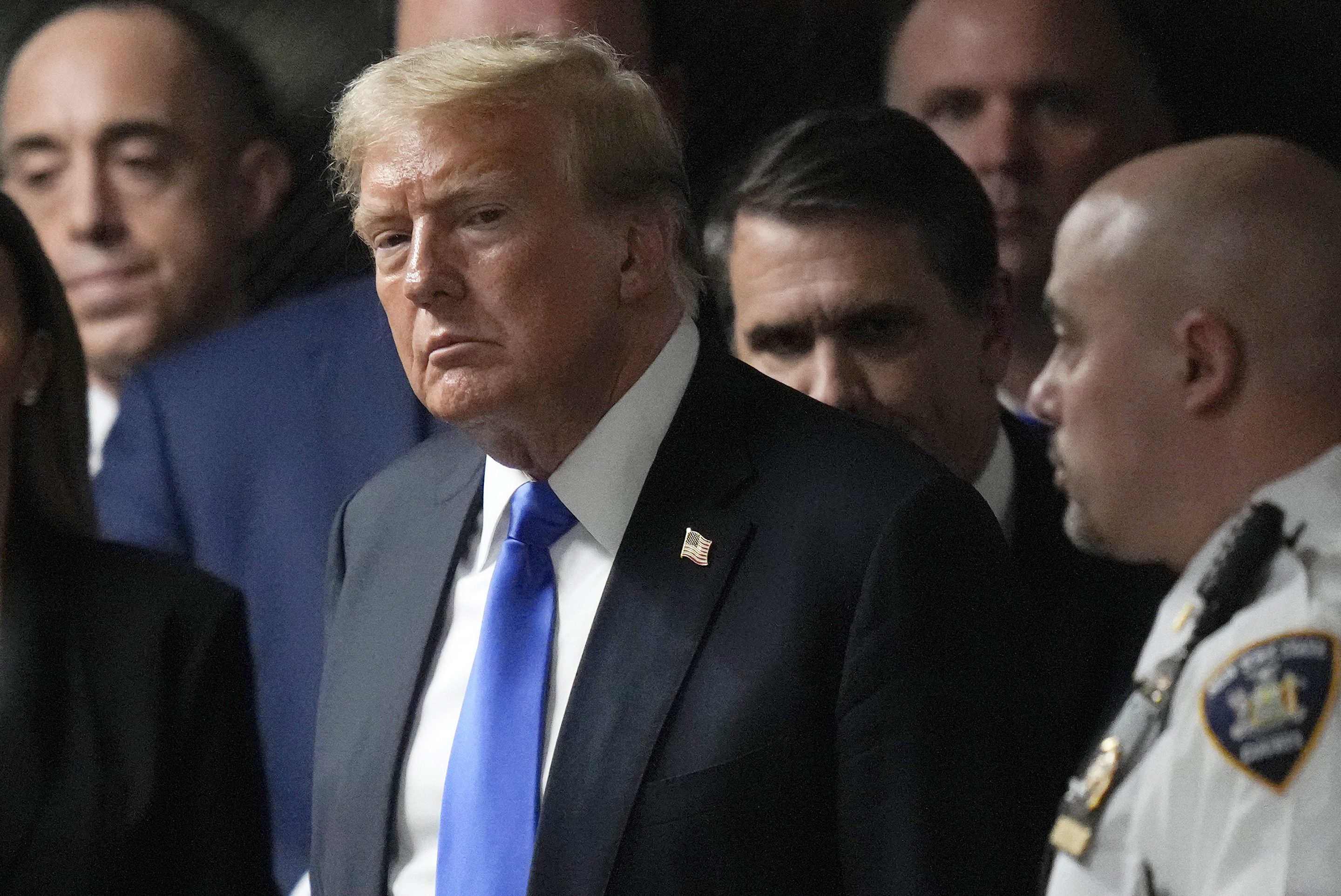 Donald Trump walks out of the courtroom