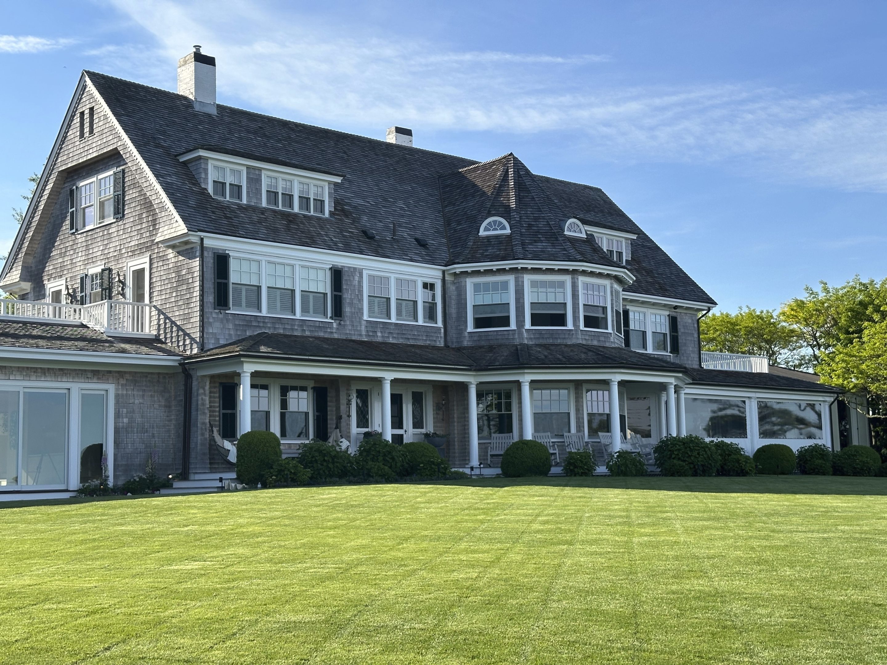 A home sits on a freshly mowed lawn in Edgartown, Mass., Tuesday, June 4, 2024. 