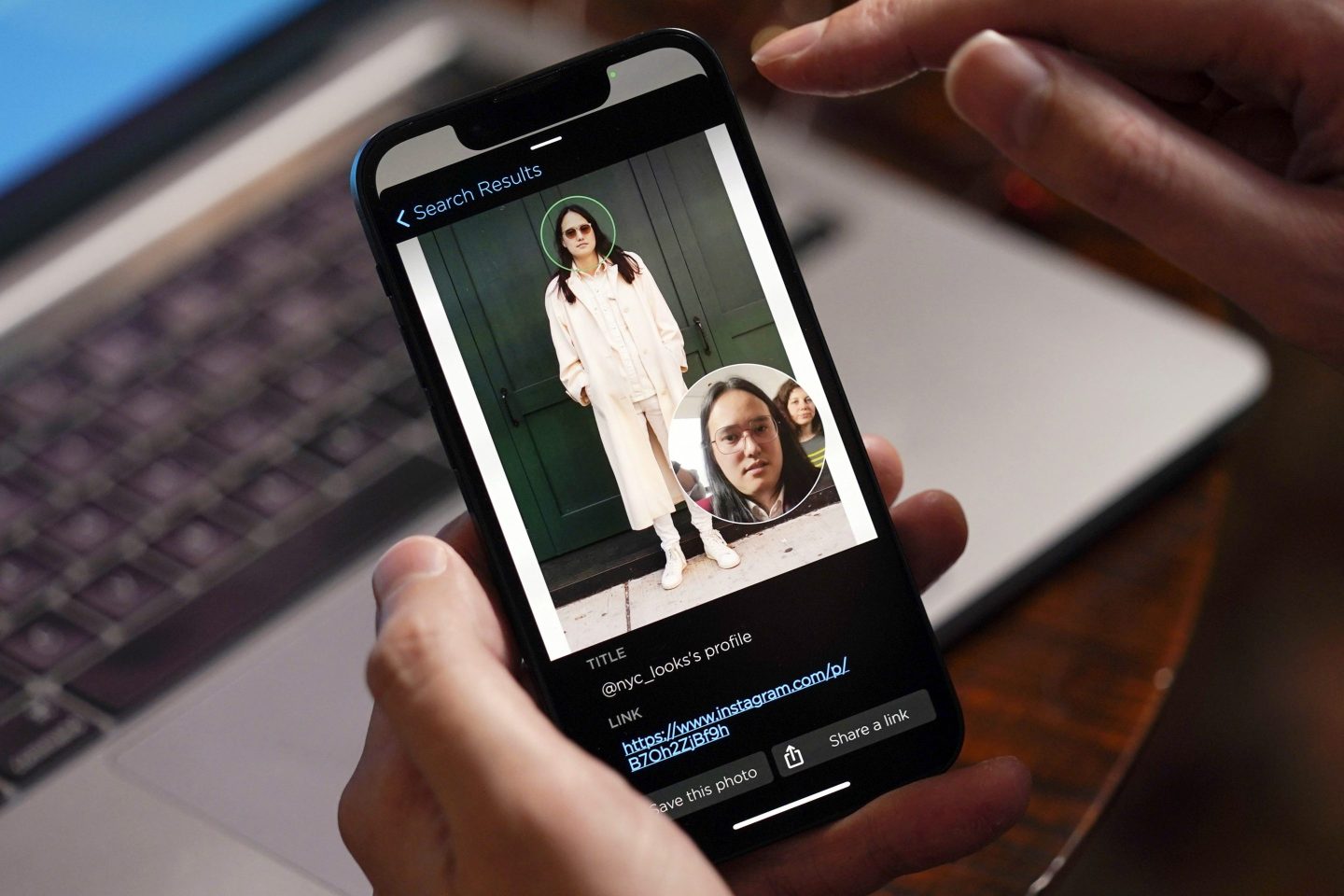 smartphone screen shows facial-recognition software