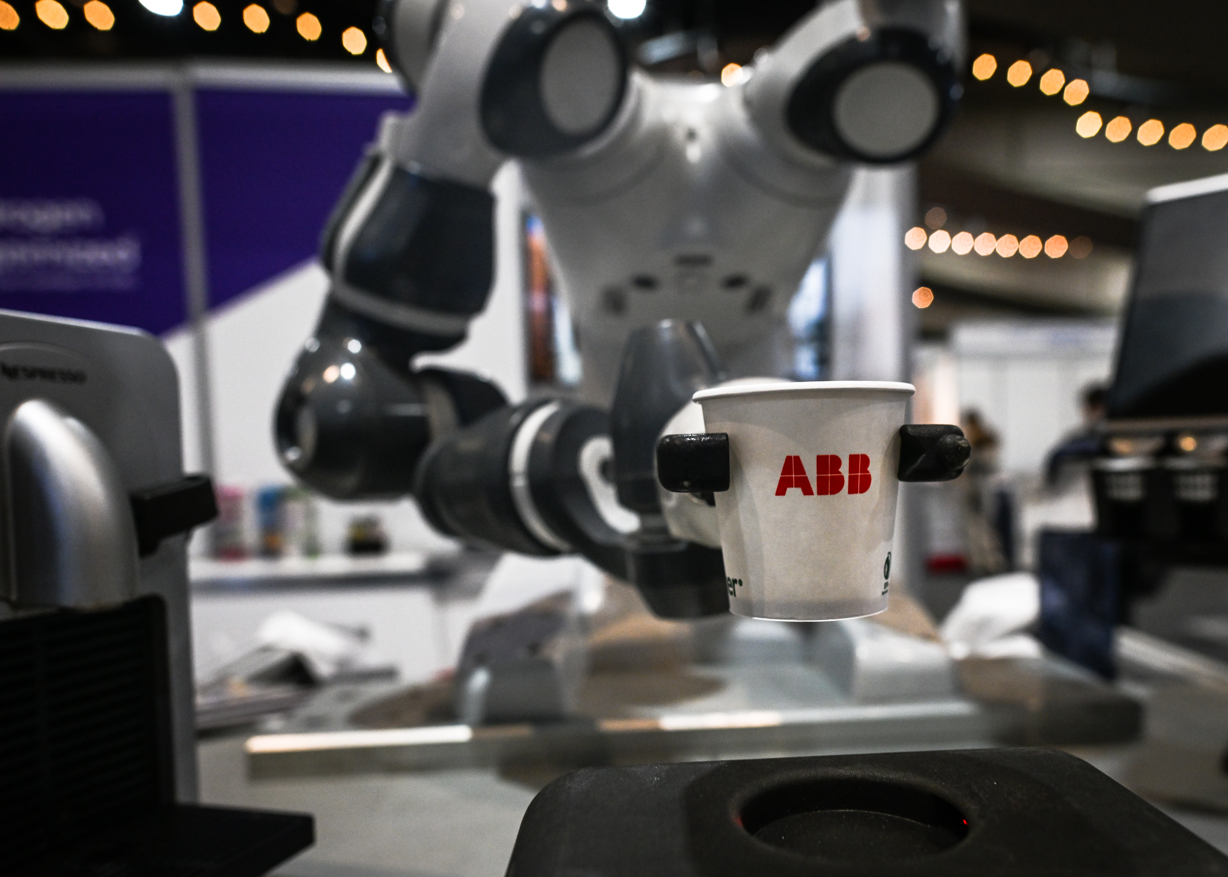 ABB Robarista Yumi cobot serving Nescafe coffee at the 2024 Canadian Hydrogen Convention.