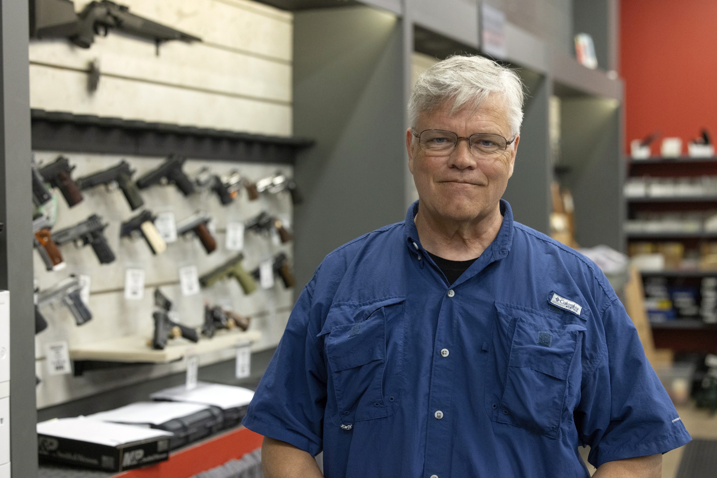 Maxon Shooter's Supplies owner Dan Eldridge poses in his store in Des Plaines, Ill., on June 25, 2024.