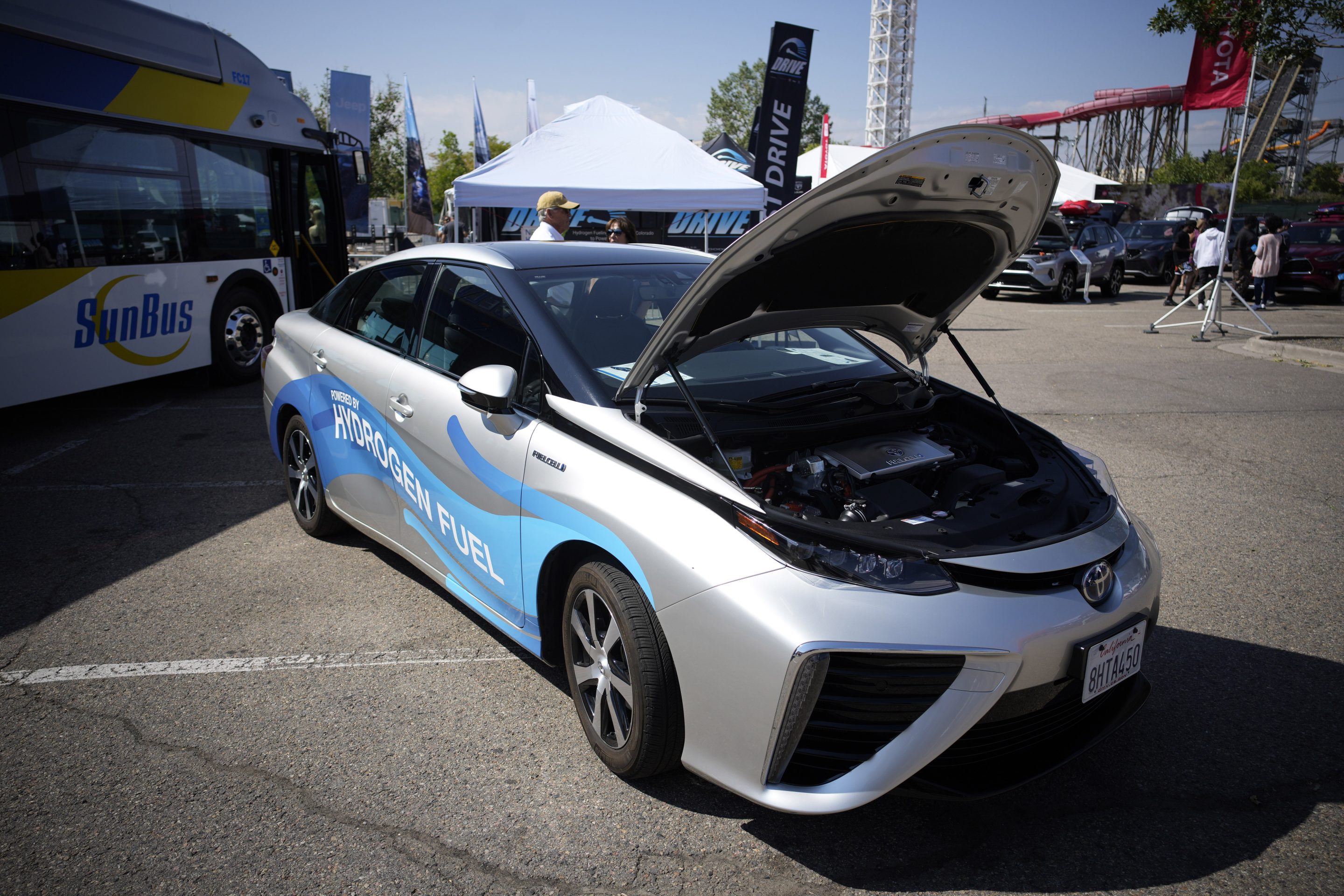 A 2021 Toyota Prius that runs on a hydrogen fuel cell sits on display at the Denver auto show on Sept. 17, 2021, at Elitch's Gardens in downtown Denver.