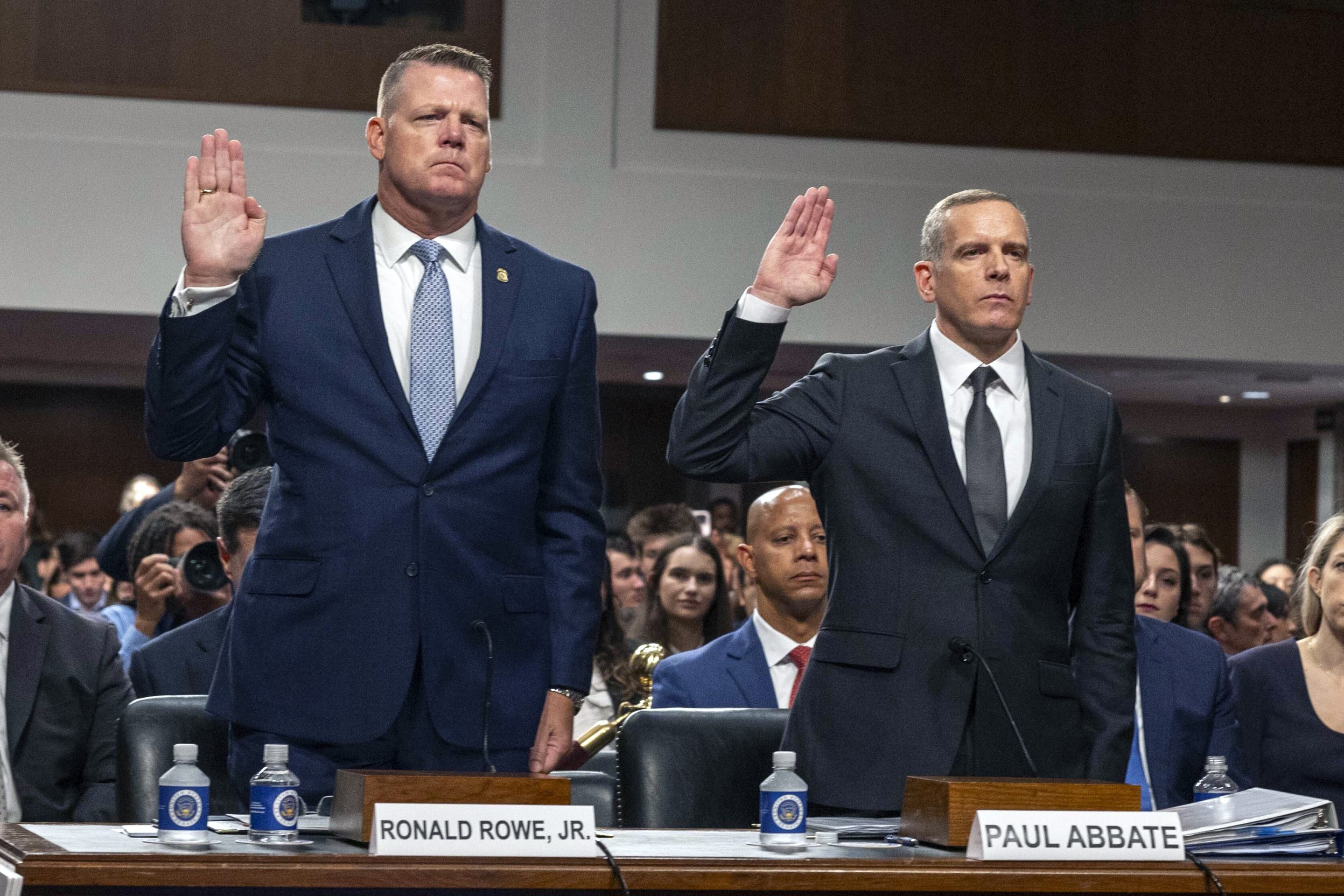 Secret Service Acting Director Ronald Rowe, left, and FBI Deputy Director Paul Abbate are sworn in before they testify before a Joint Senate Committee on Homeland Security and Governmental Affairs and Senate Committee on the Judiciary hearing examining the security failures leading to the assassination attempt on Republican presidential candidate former President Donald Trump, on July 30, 2024 in Washington.