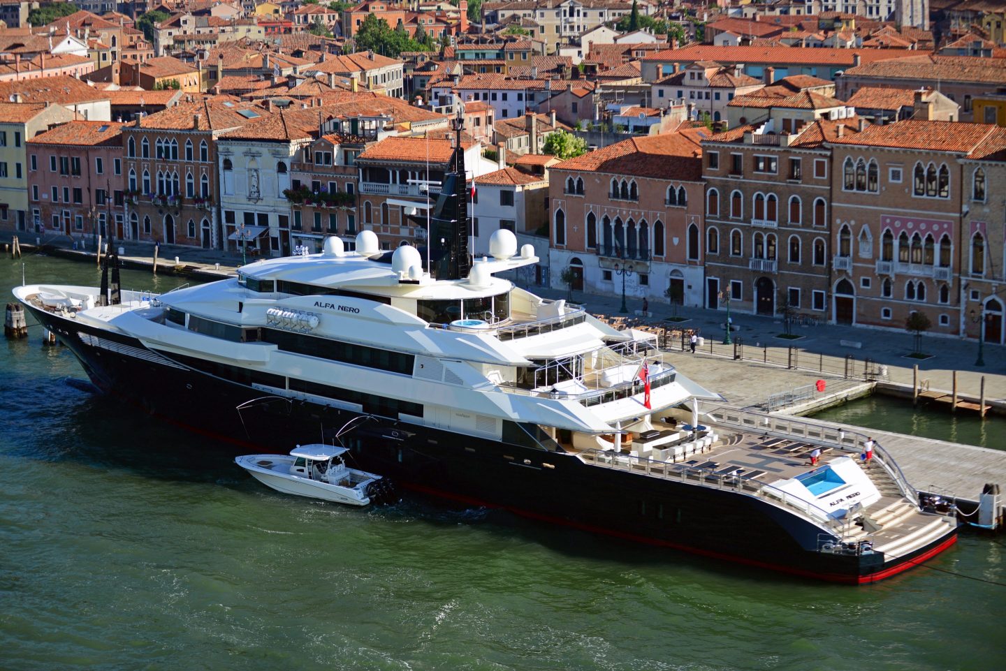 superyacht docked at pier