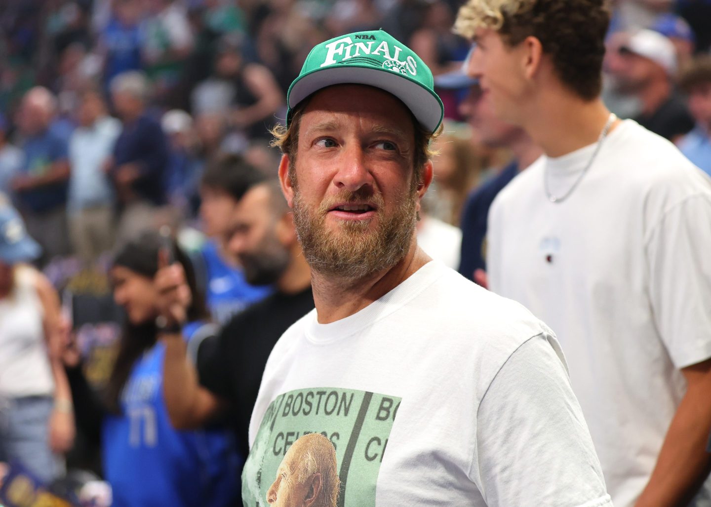 Dave Portnoy stands on the sidelines at the NBA Finals