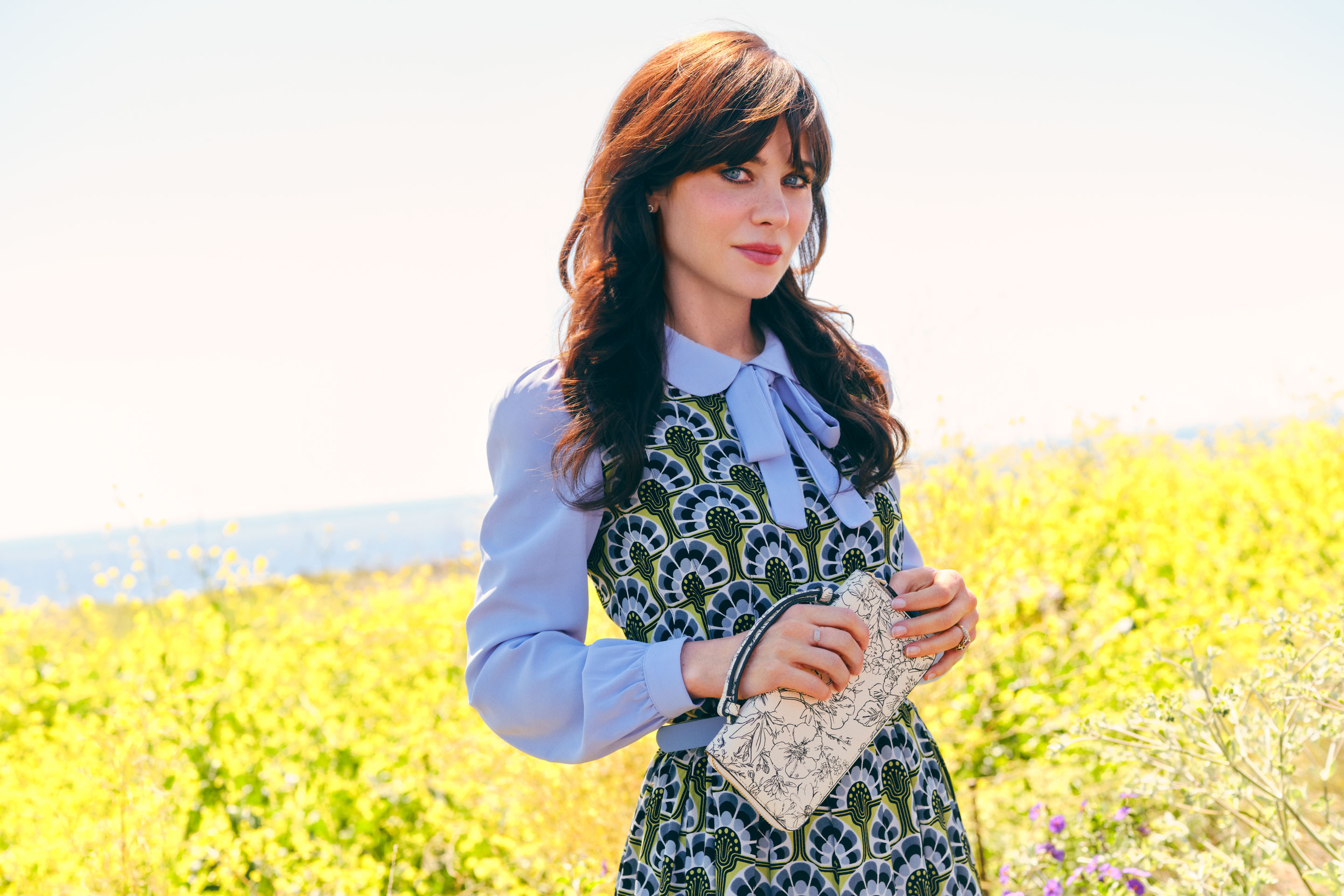 Actress Zooey Deschanel is the new spokesperson for quilted bag brand Vera Bradley as it attempts a comeback. 
