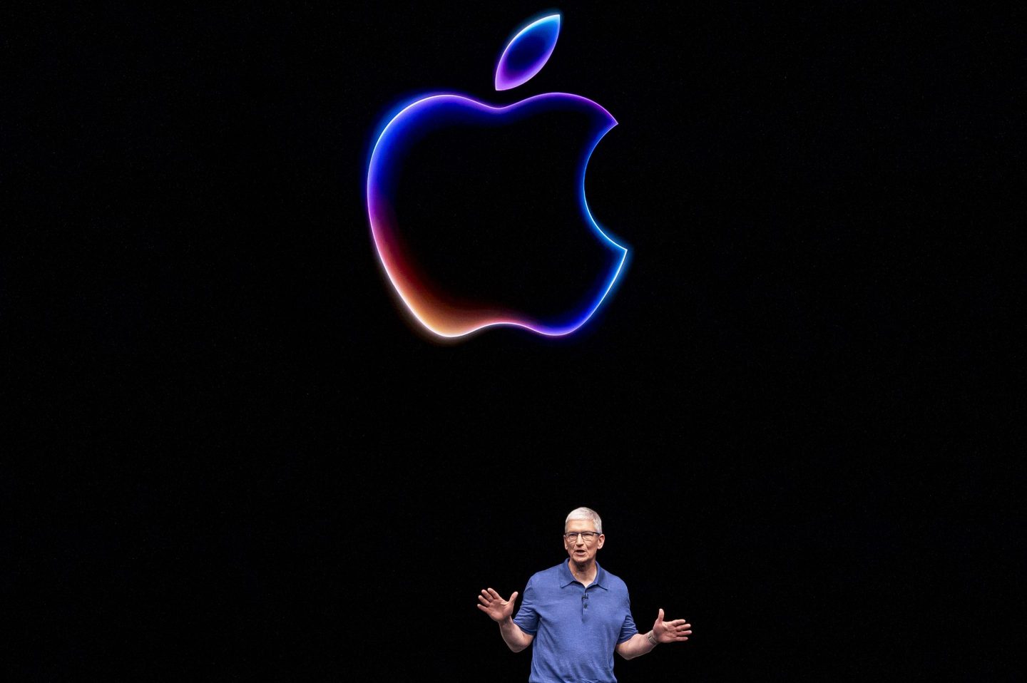 Tim Cook, chief executive officer of Apple Inc., during the Apple Worldwide Developers Conference at Apple Park campus in Cupertino, California, US, on Monday, June 10, 2024. The conference will show whether Apple Inc. can become a major player in the burgeoning field of artificial intelligence, marking a critical moment for a company forced to adapt to a new era. Photographer: David Paul Morris/Bloomberg via Getty Images