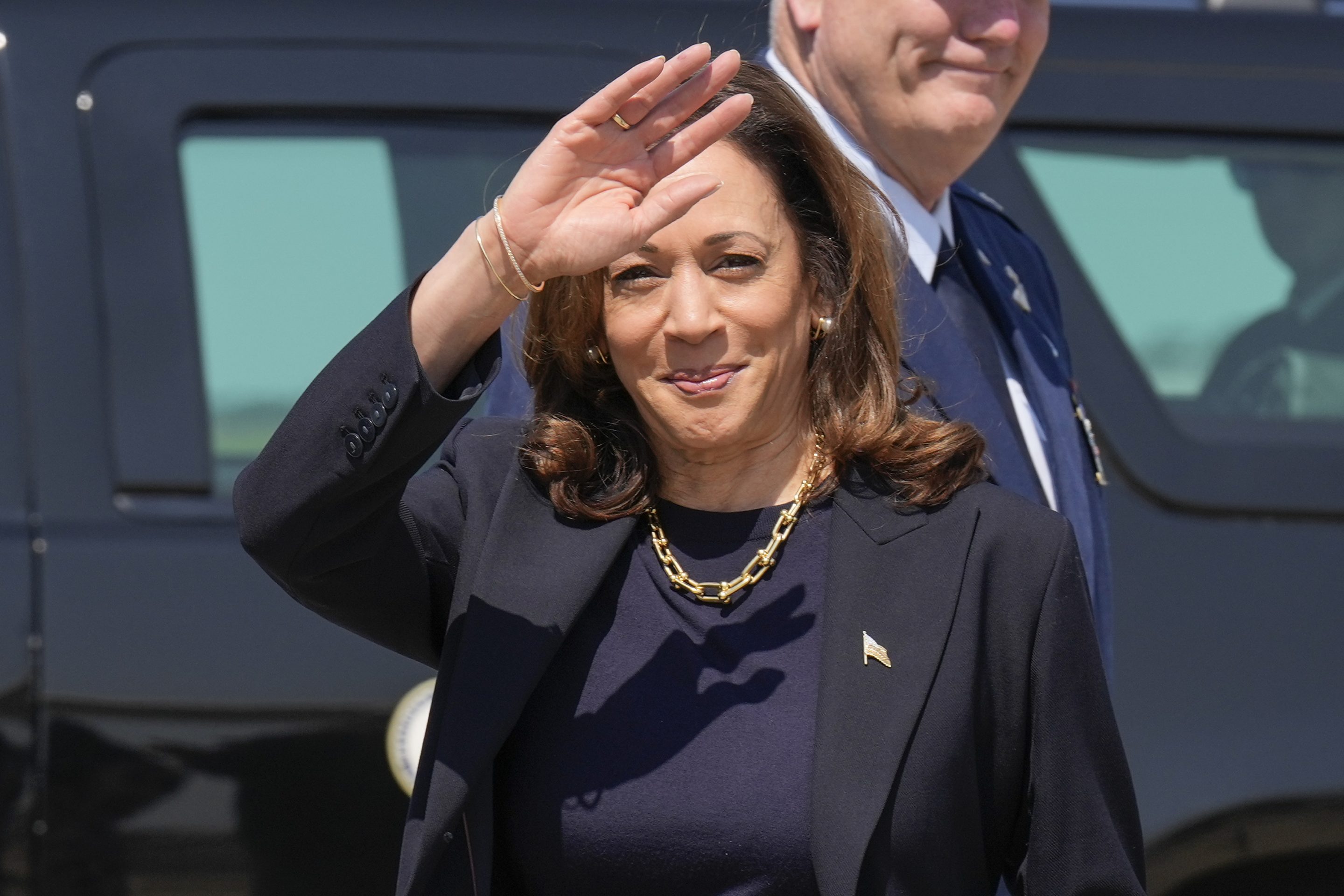 Democratic presidential nominee Vice President Kamala Harris waving to media members as she arrives at Pittsburgh International Airport, in Coraopolis, Pa., on Sept. 5, 2024.