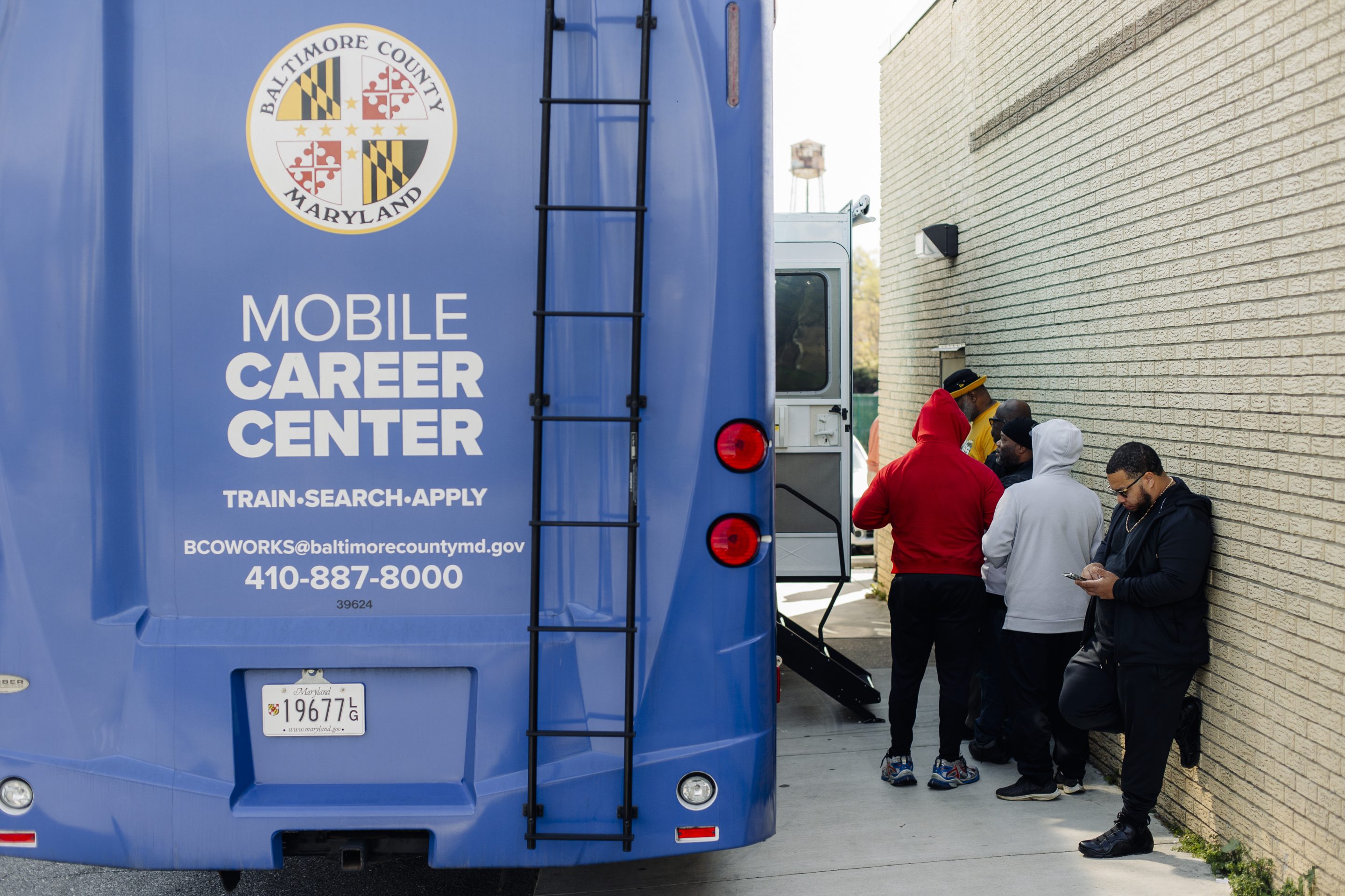 Longshoreman who have lost work since the Key Bridge collapsed wait outside The Mobile Career Center, part of the County's Economic and Workforce Development System, outside the Steamship Trade Association on April 8, 2024 in Baltimore.